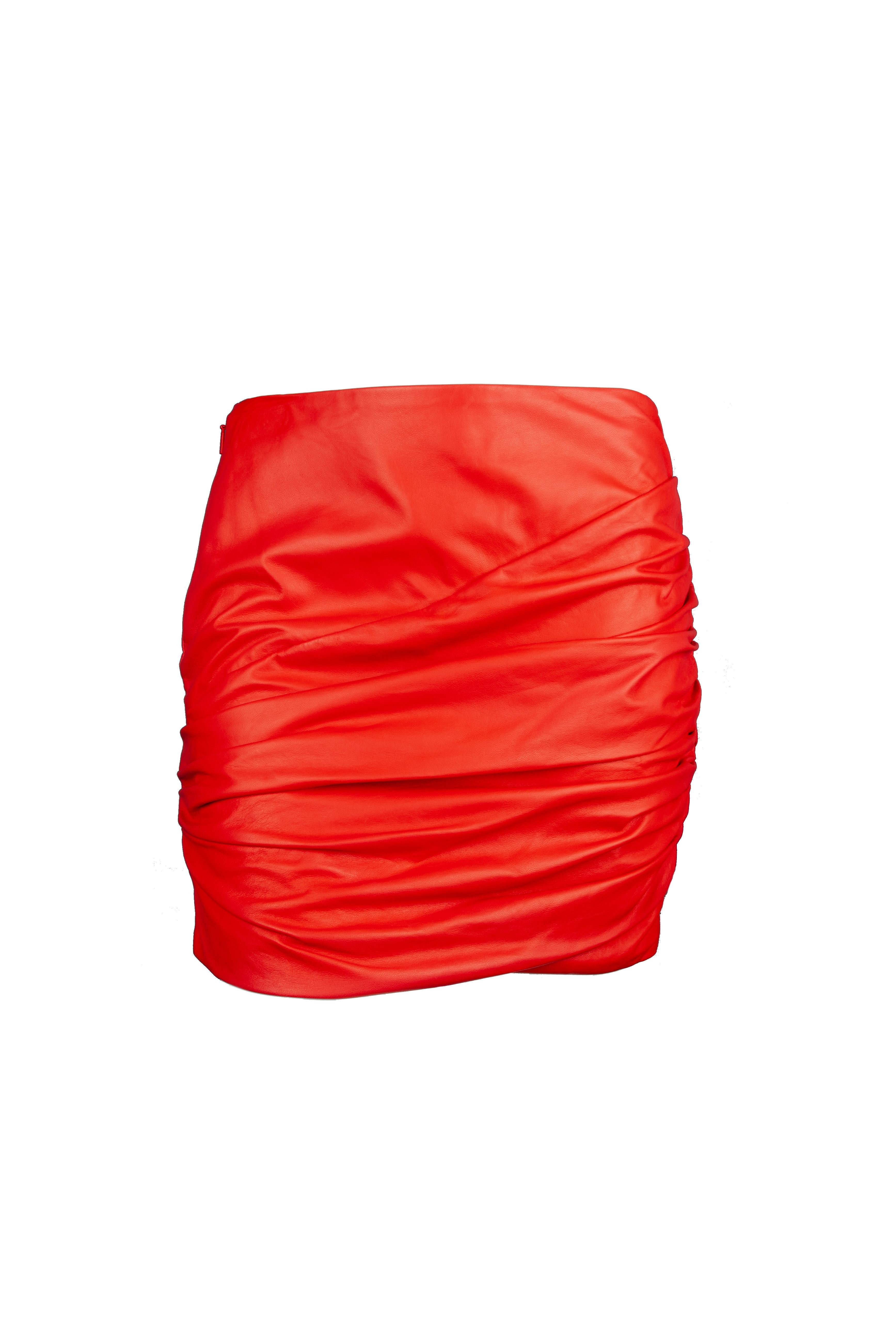 This Versace red mini skirt features asymmetric ruching, lambskin leather and a side zip fastening. The soft red leather is perfect for a bold statement. To recreate the runway look, pair it with the blue leather top also available at our store.