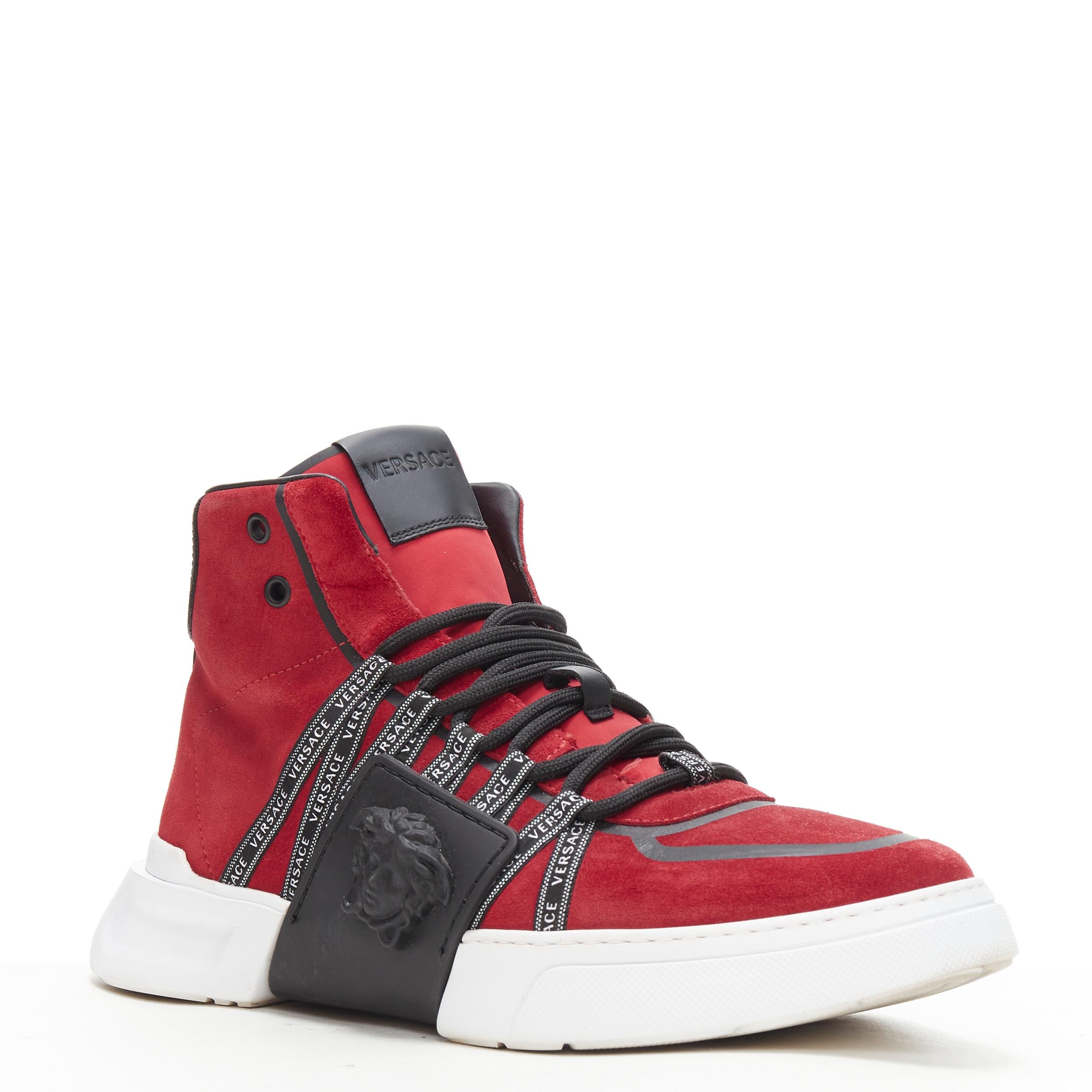 VERSACE red suede Medusa emblem nastro logo ribbon high top sneakers EU40 
Reference: TGAS/B01046 
Brand: Versace 
Designer: Donatella Versace 
Model: Medusa high top sneaker 
Material: Suede 
Color: Red 
Pattern: Solid 
Closure: Lace Up 
Extra