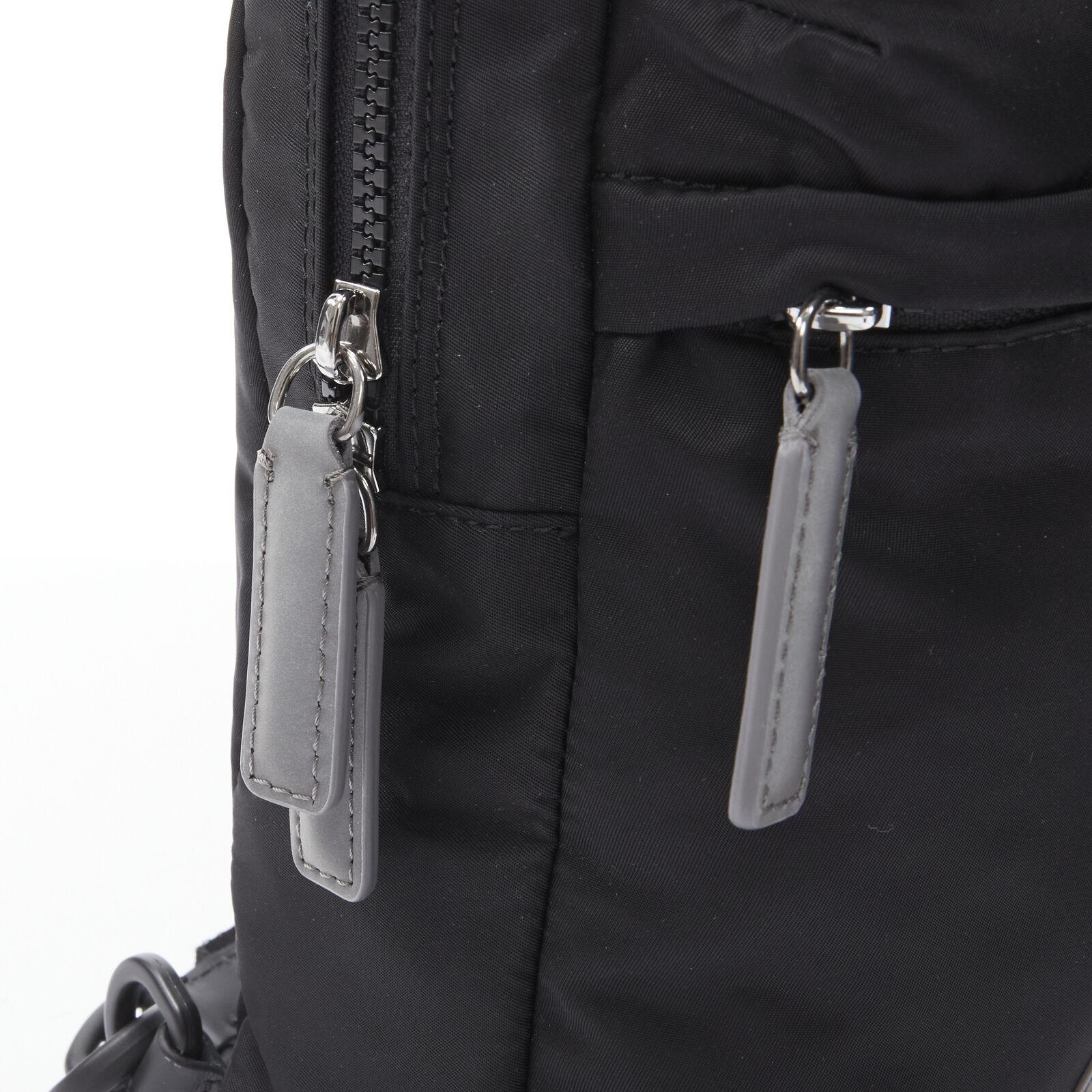 VERSACE reflective logo black nylon Greca sports strap sling crossbody bag For Sale 6