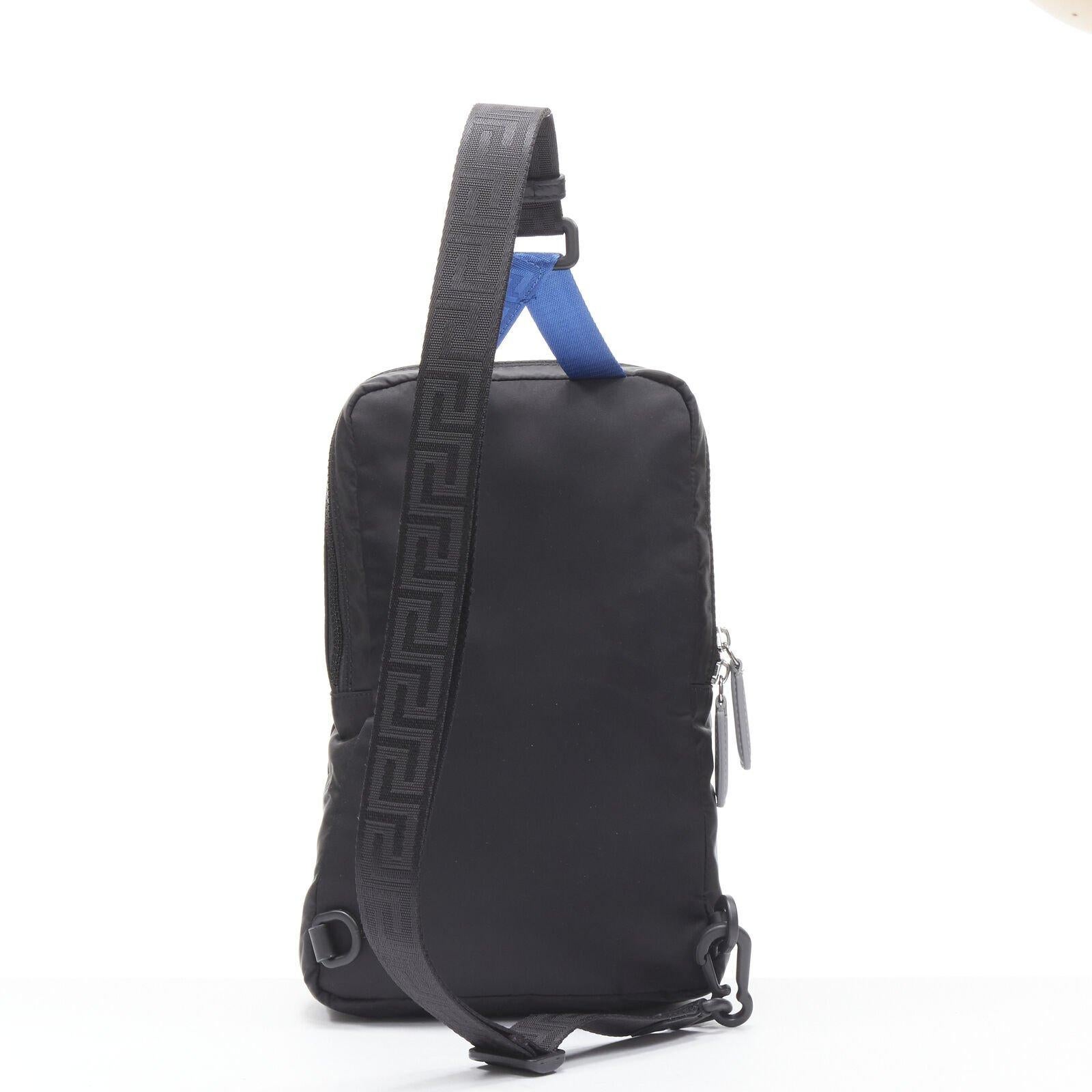 VERSACE reflective logo black nylon Greca sports strap sling crossbody bag For Sale 1