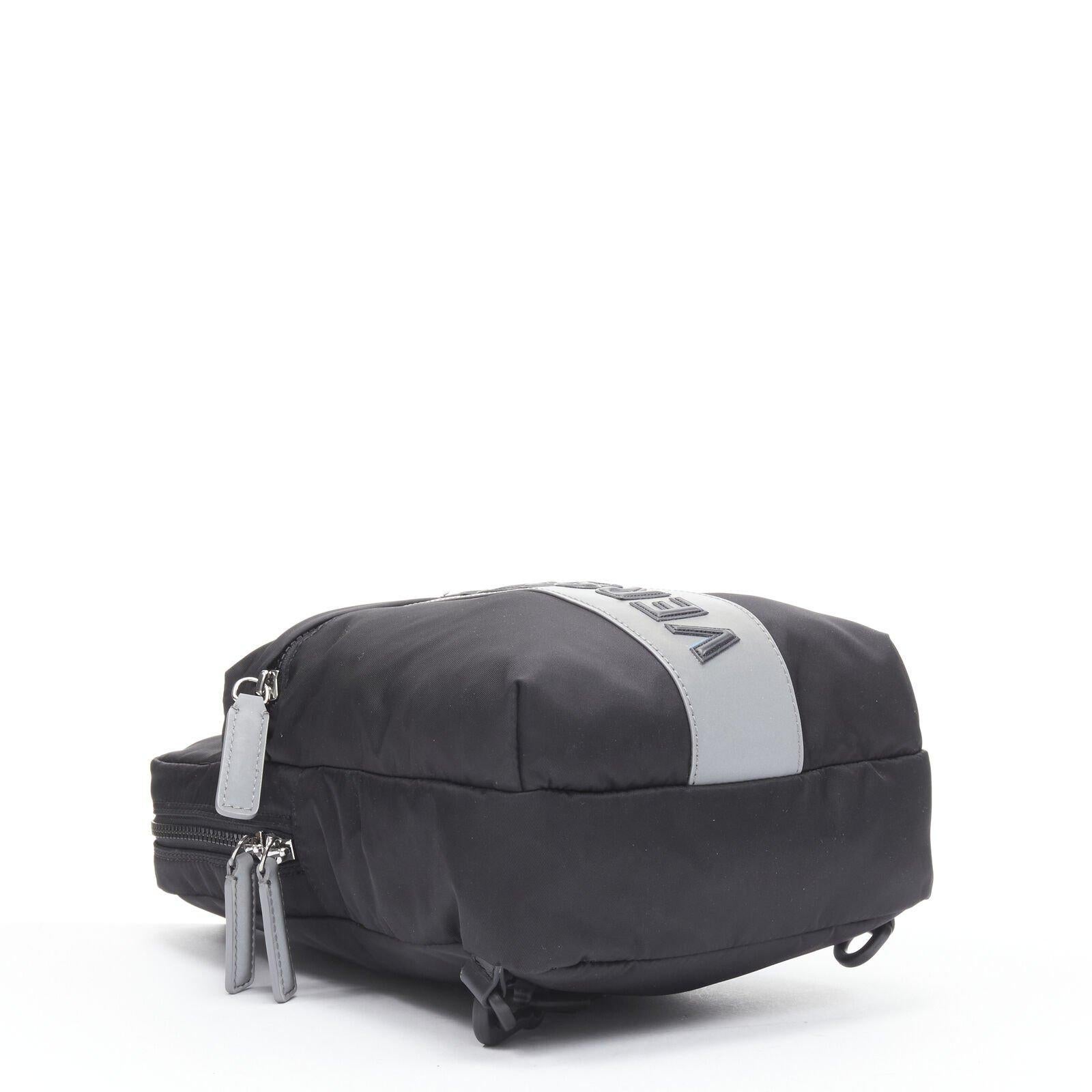 VERSACE reflective logo black nylon Greca sports strap sling crossbody bag For Sale 2