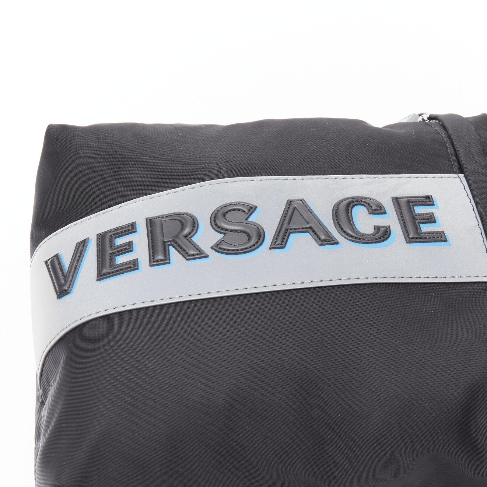 VERSACE reflective logo black nylon Greca sports strap sling crossbody bag For Sale 3
