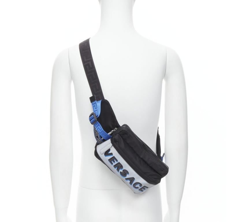 VERSACE reflective logo black nylon Greca strap crossbody belt waist bag
Reference: TGAS/C00878
Brand: Versace
Designer: Donatella Versace
Model: DFB8077 DNY2R K046E
Collection: Pre Fall 2020
Material: Nylon
Color: Black, Blue
Pattern: