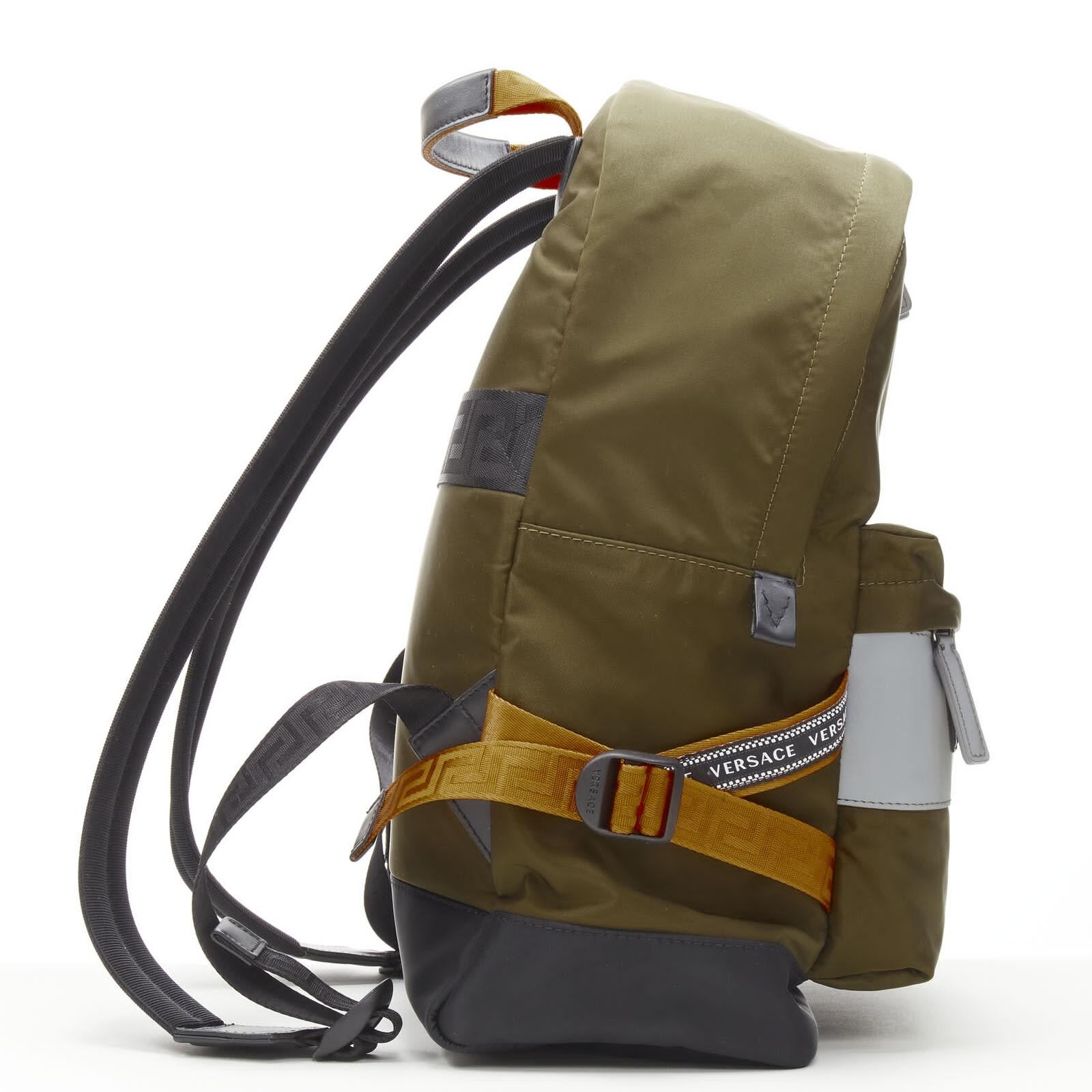 VERSACE Reflective Logo green nylon orange Greca strap backpack In New Condition For Sale In Hong Kong, NT