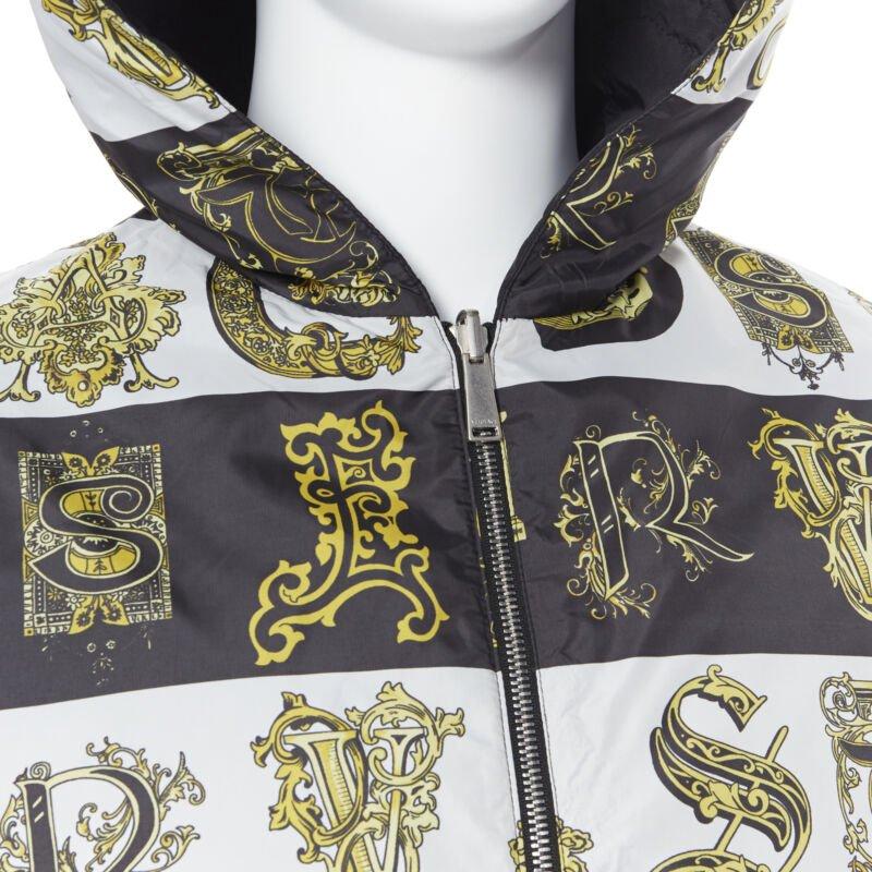 Gray VERSACE Reversible Baroque Alphabet gold black nylon quilted jacket IT58 4XL For Sale