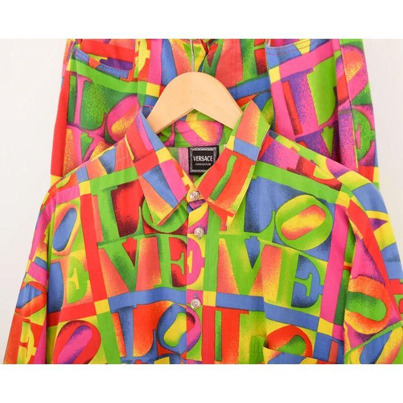Vintage Spring Summer 1995 Versace Jeans Couture long sleeve shirt. 

Depicting the iconic 'LOVE' artwork by Robert Indiana throughout.  

Features
Central line button fasten
Chest pocket
Long sleeves
100% Cotton
Sizing: Pit to Pit: 27''
Pit to