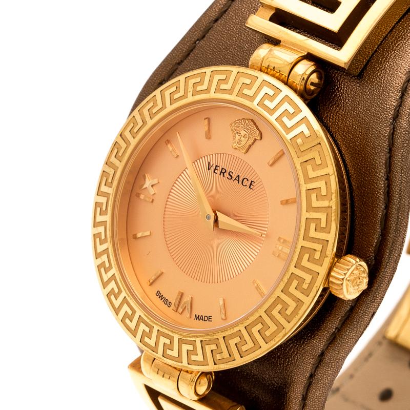 This Versace wristwatch will surely be an upbeat addition to your casual style. The case of the watch is made from gold-plated stainless steel and set on the leather strap. It has signature engravings on the bezel and on the dial, there are index