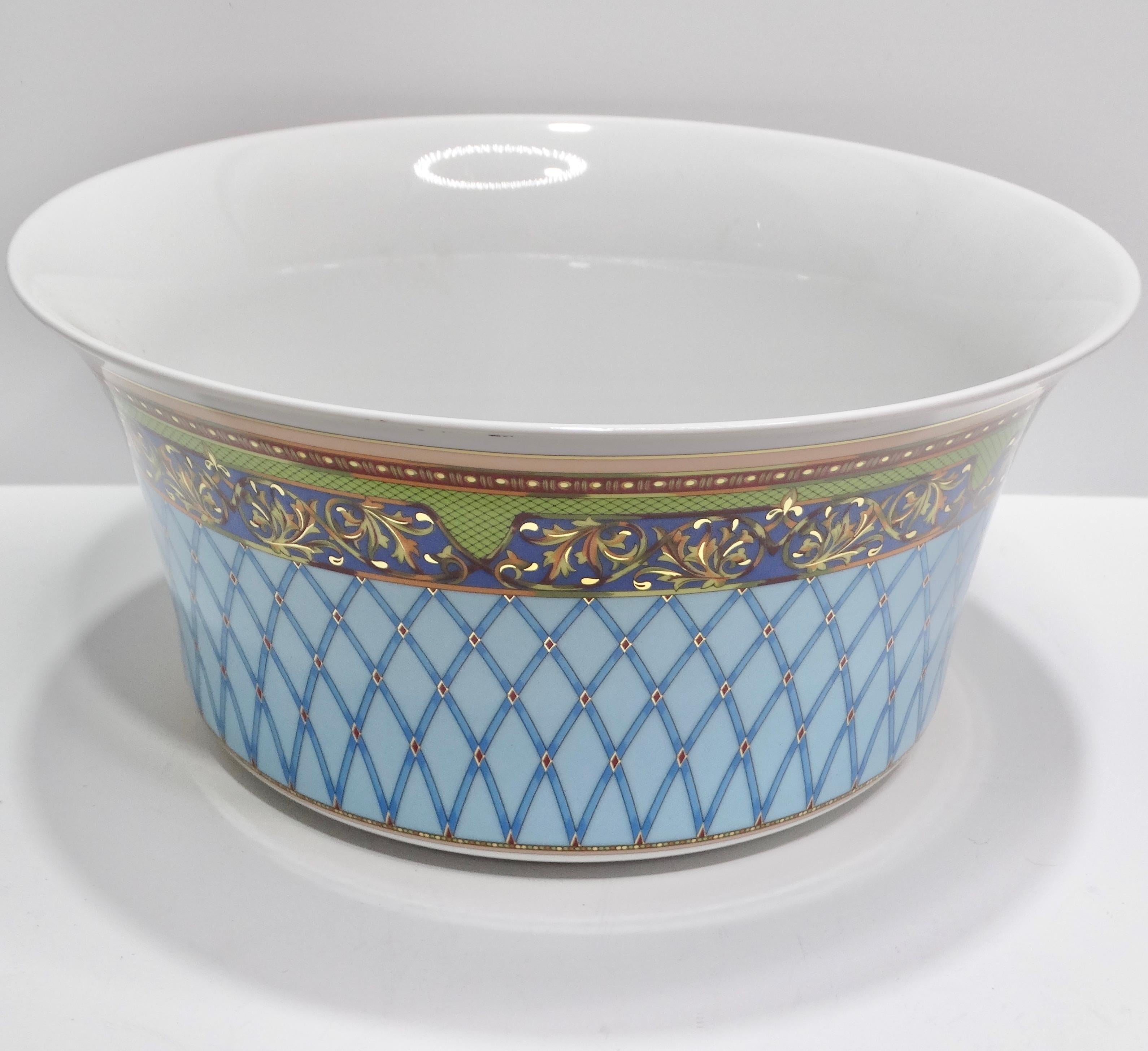 Do not miss out on the Versace Rosenthal 1990s Russian Dream Porcelain Bowl – a luxurious and artful addition that brings opulence to your dinner table or barware collection. Crafted from fine porcelain, this large bowl showcases an intricate