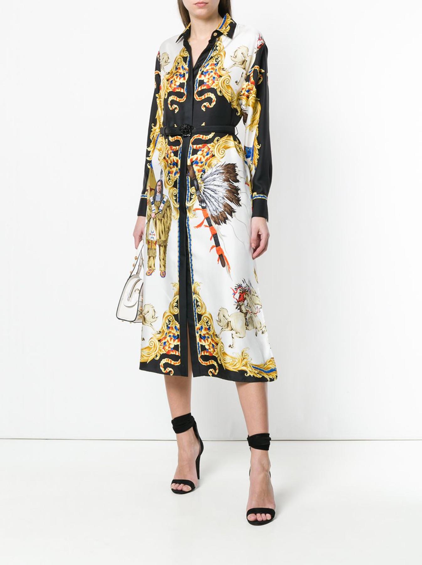 The Native American print featured on this long sleeve silk dress is lifted directly from Versace's archived 1992 collection and reworked for the Spring 2018 runway. It was part of the tribute collection Donatella assembled in honor of her late