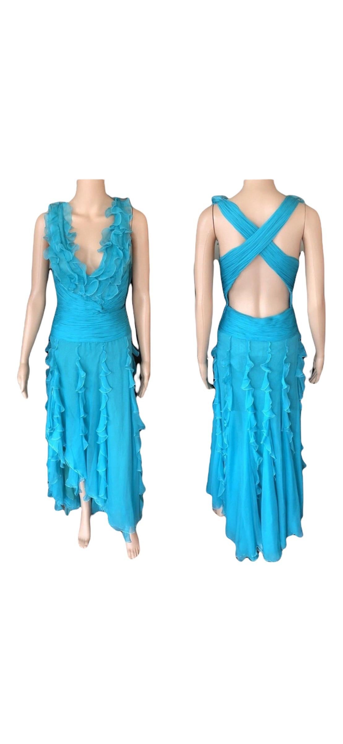 Versace S/S 2004 Runway Plunged Halter Open Back Ruffles Evening Dress Gown Size IT 40

Versace silk sleeveless maxi dress with halter neck, ruffle accents throughout and concealed zip closure at side.

