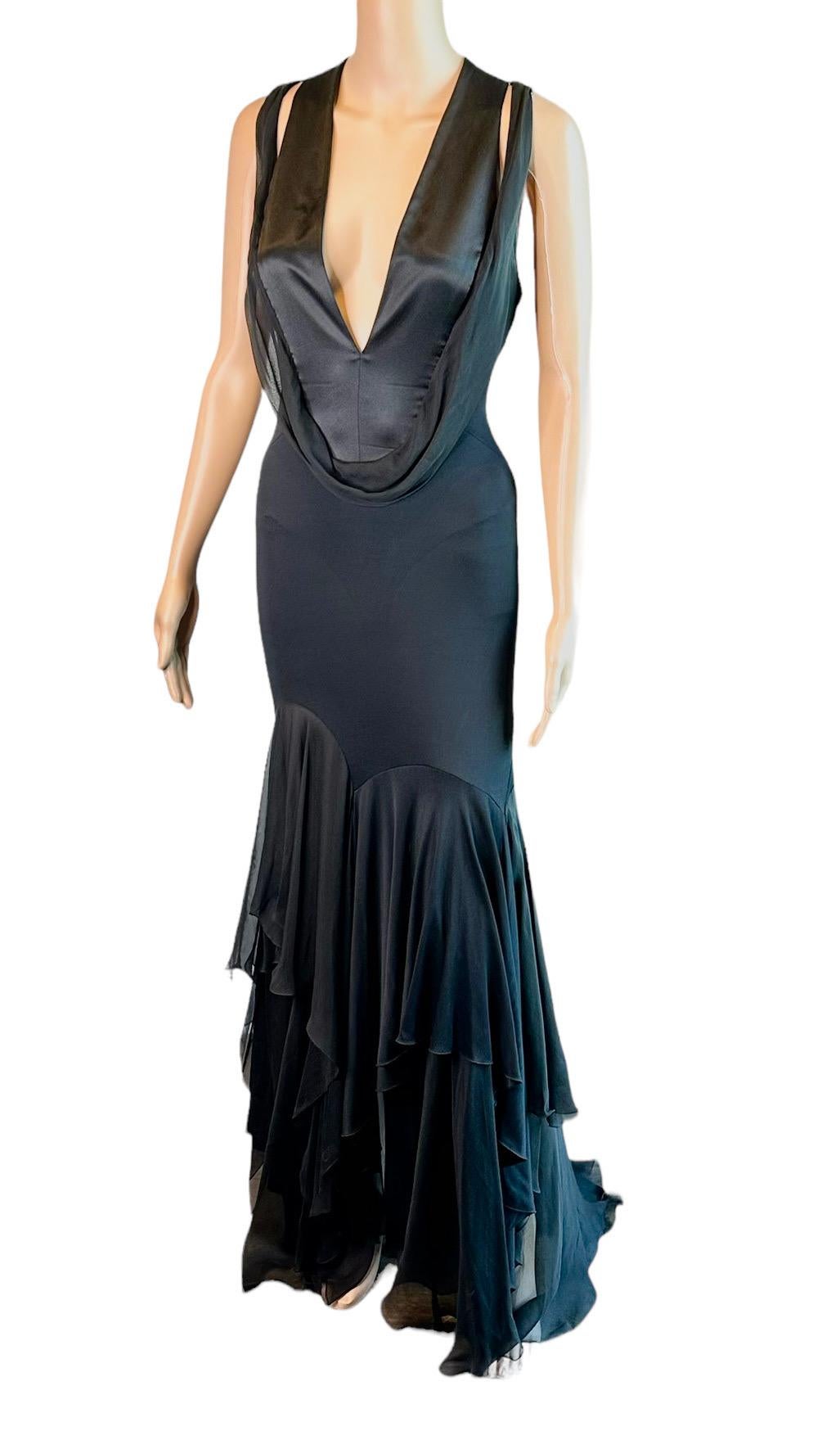 Versace S/S 2004 Plunged Halter Open Back Ruffles Black Evening Dress Gown Size IT 42

Versace black sleeveless maxi dress featuring plunging halter neckline, ruffle accents throughout and concealed zip closure at side.

