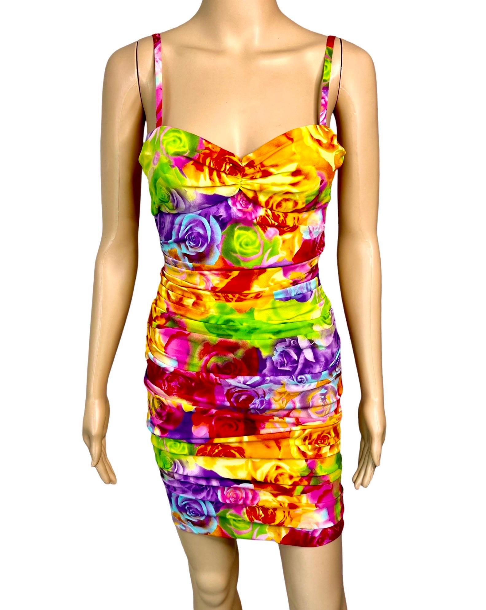 Versace S/S 2005 Bustier Bra Floral Print Bodycon Ruched Dress IT 40

Please note, based on preference the length of the dress is adjustable depending on how the client would like to style it, ruched up for a mini dress look or pulled down for a