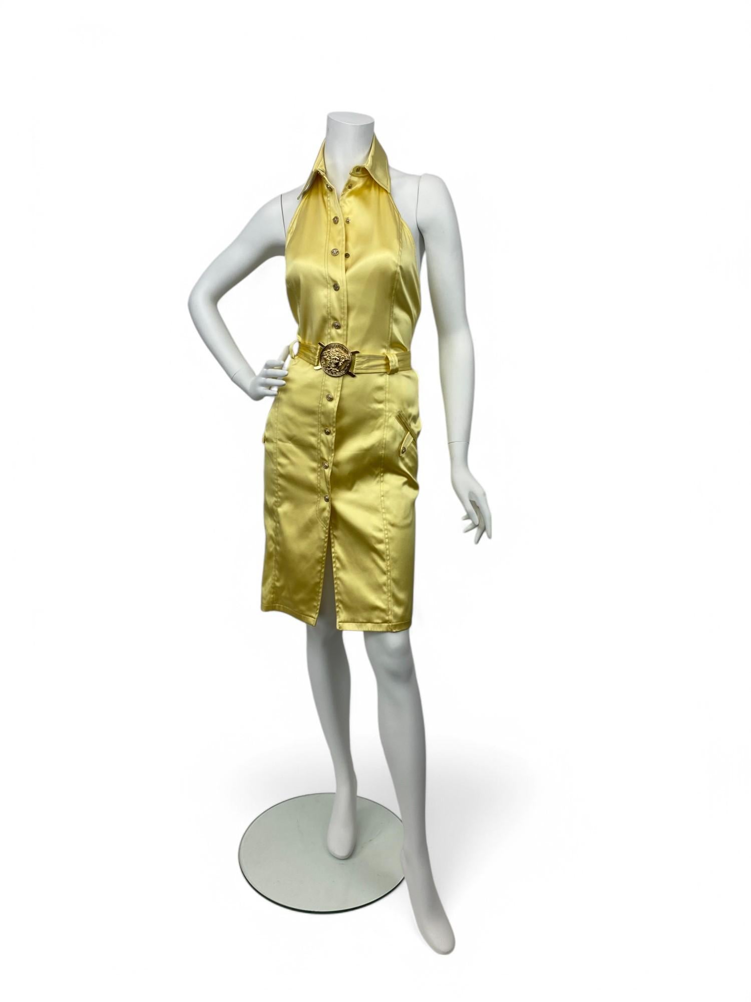 A radiant and sultry piece from Versace’s Spring/Summer 2005 collection, this yellow silk dress captures the brand’s signature blend of sensuality and elegance. Crafted from fluid, lightweight silk, the dress drapes beautifully over the body, with a