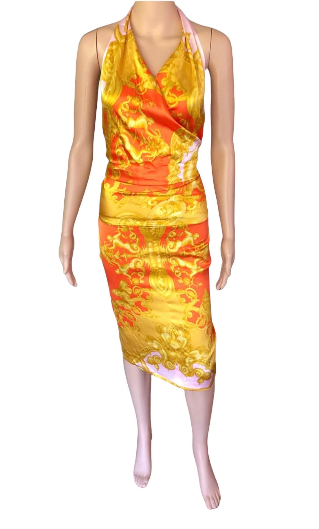 Versace S/S 2005 Runway Campaign Halter Open Back Dress IT 42

Look 29 from the Spring 2005 Collection. Rust, pink and gold Versace stretch midi halter dress with mermaid print featuring seashells and butterflies throughout, surplice neckline,