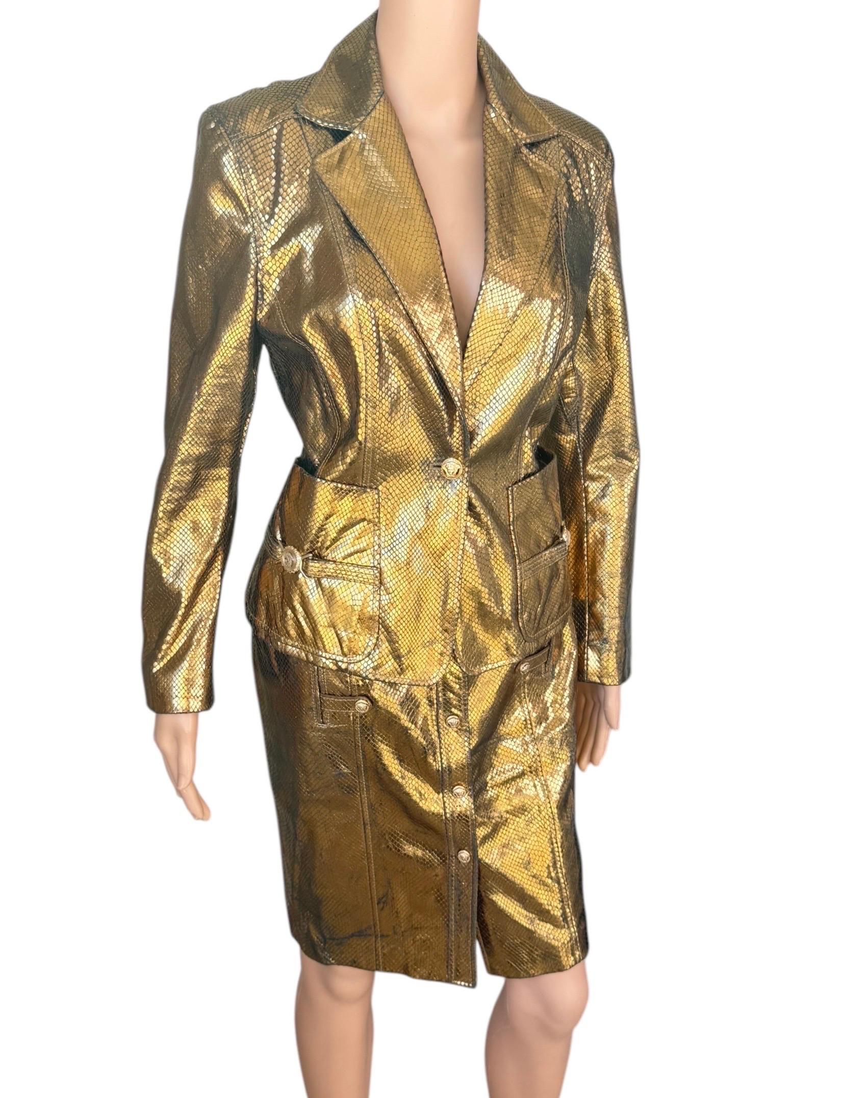 Versace S/S 2005 Runway Gold Leather Blazer Jacket Top & Skirt 2 Piece Set Ensemble

Condition: Good vintage condition. Please note jacket is size IT 44 while the skirt is size IT 40. Some of the gold paint has naturally rubbed off due to age giving