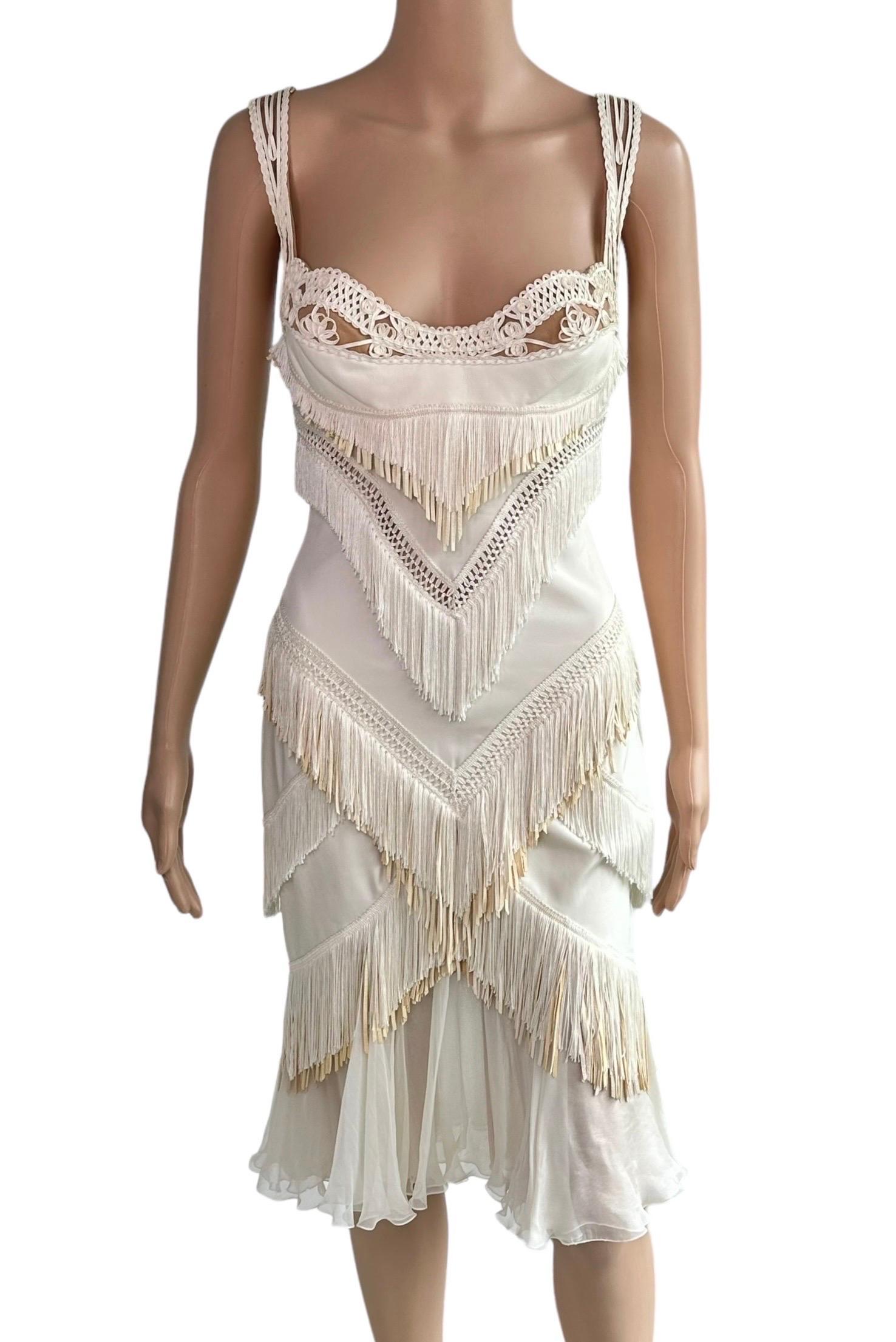 Versace S/S 2006 Runway Bustier Sheer Mesh Bra Fringed Leather Silk Ivory Dress 

Size IT 42

Modeled on the Spring 2006 Menswear Collection Runway by Natasha Poly.

Condition: The leather fringes are aged. There is a slight discoloration (last