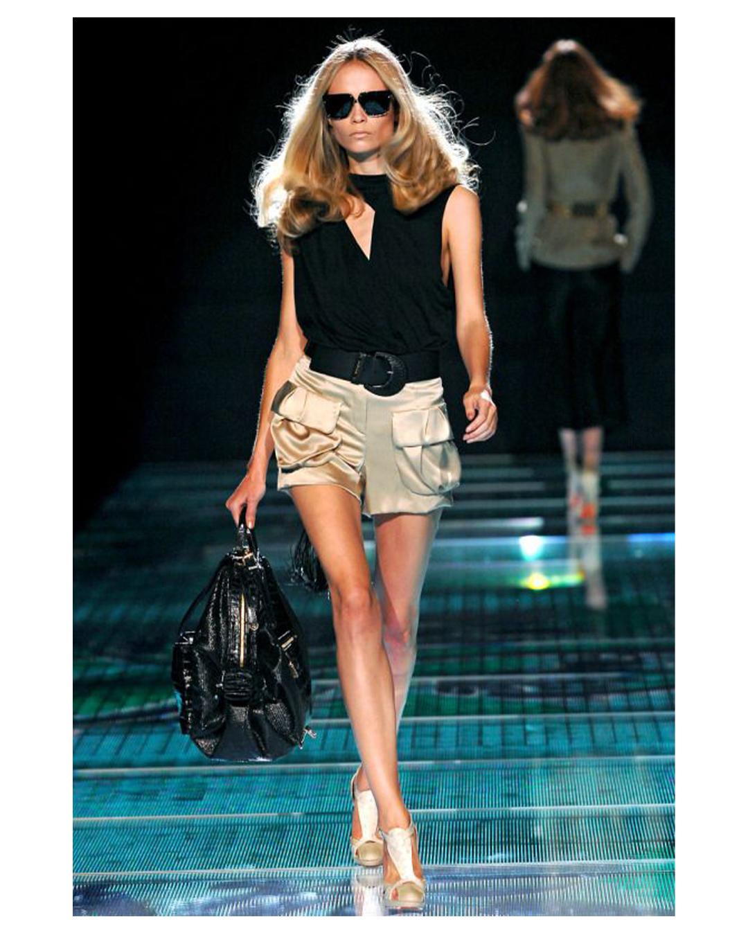 Versace Spring Summer 2008 silk cargo shorts in beige
Two large oversized pockets to the front
Can be worn high on the waist or low on the hips as on the runway depending on your waist measurement (please refer to the measurements below)
Concealed