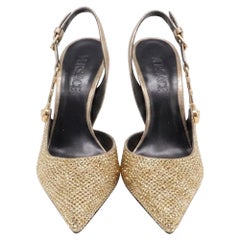 Versace Safety Pin Embellished Pumps in Gold Crystal