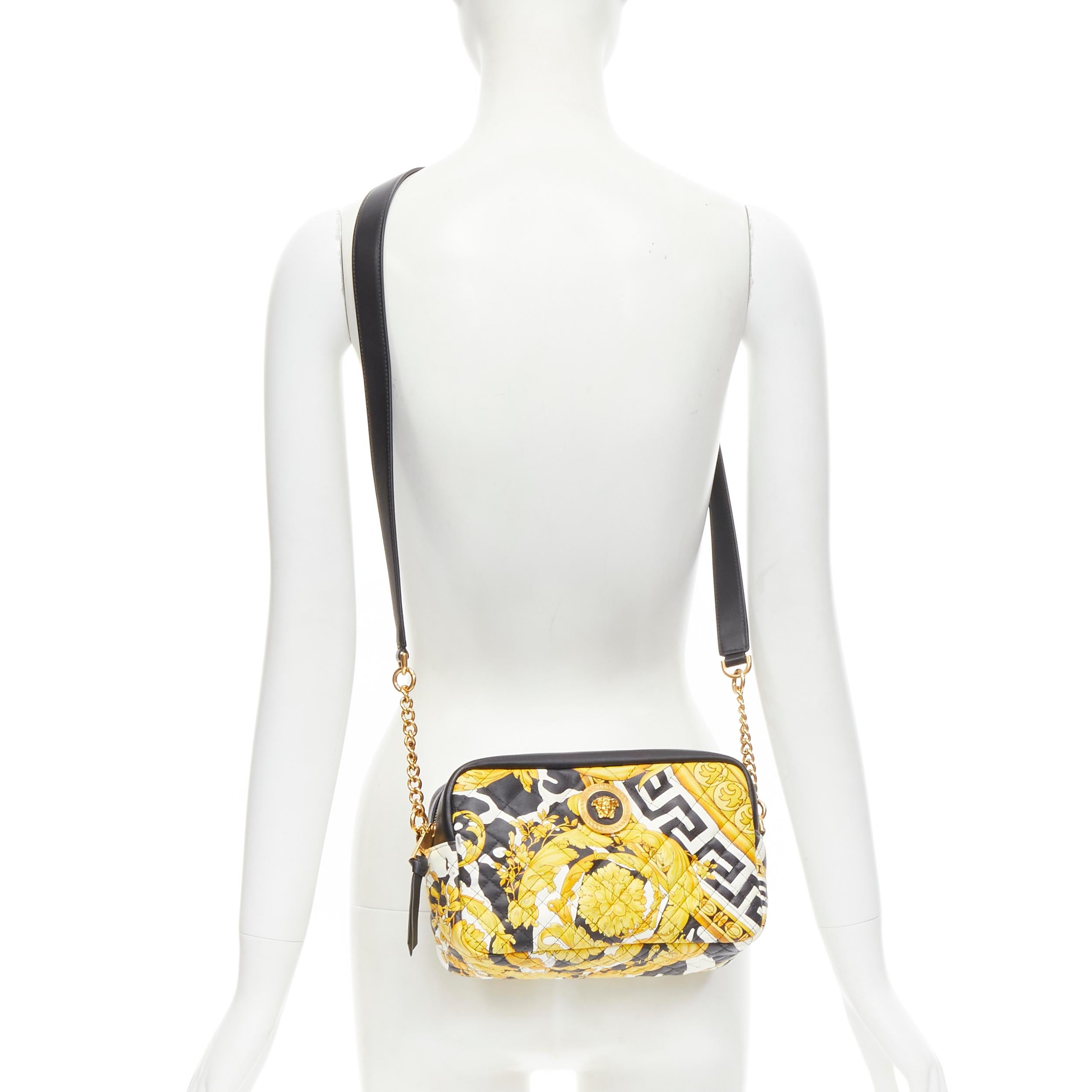 VERSACE Savage Barocco black gold diamond quilted Medusa crossbody camera bag 
Reference: TGAS/B01652 
Brand: Versace 
Designer: Donatella Versace 
Model: Savage barocco crossbody 
Collection: 2020 
Material: Leather 
Color: Gold 
Pattern: Floral