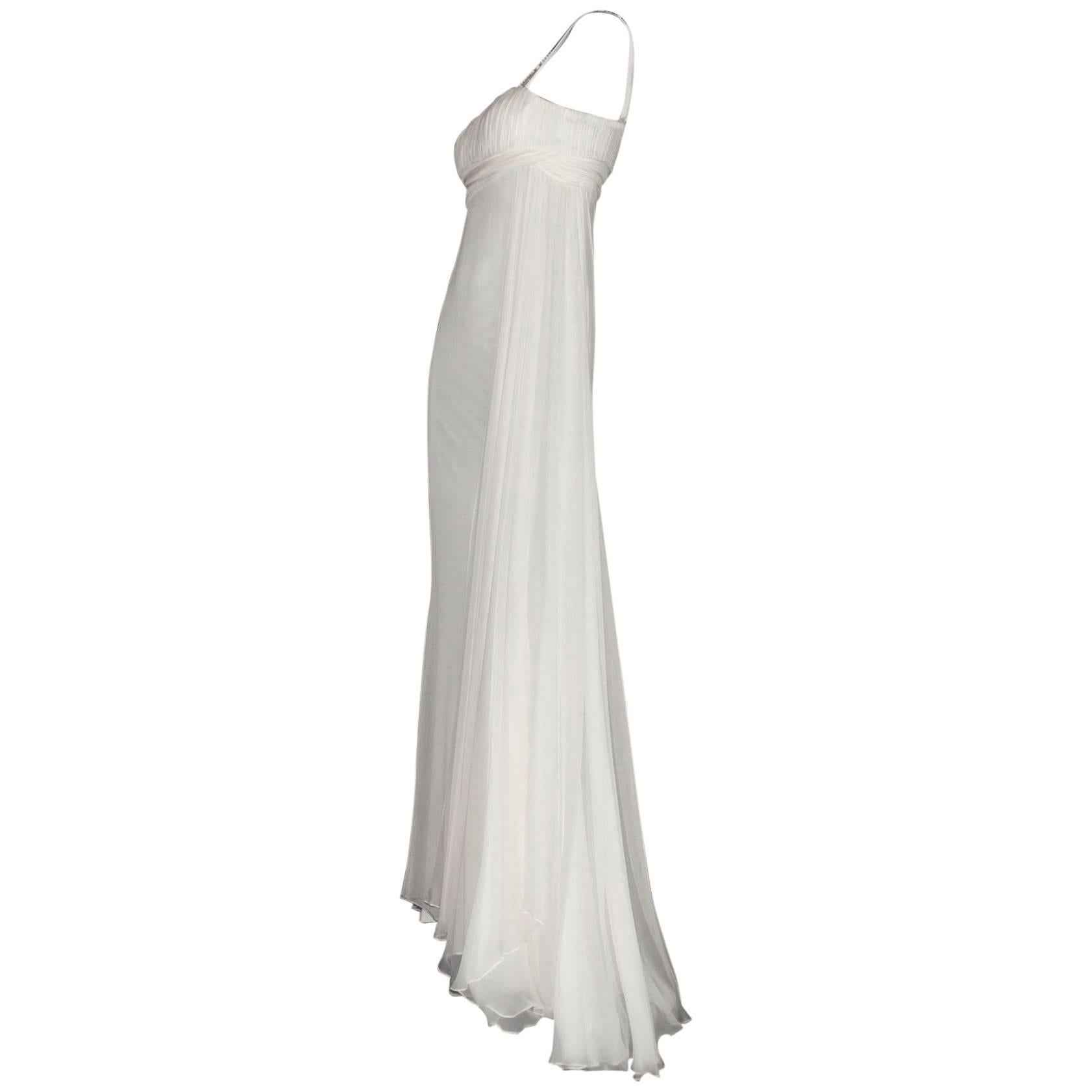 Increíble vestido de noche Versace Grecian Goddess de seda

    Precioso vestido de noche blanco roto inspirado en las diosas griegas de Versace
    Preciosos tirantes decorados con motivos de meandro griego de cristal de Swarovski dorado: ¡tan