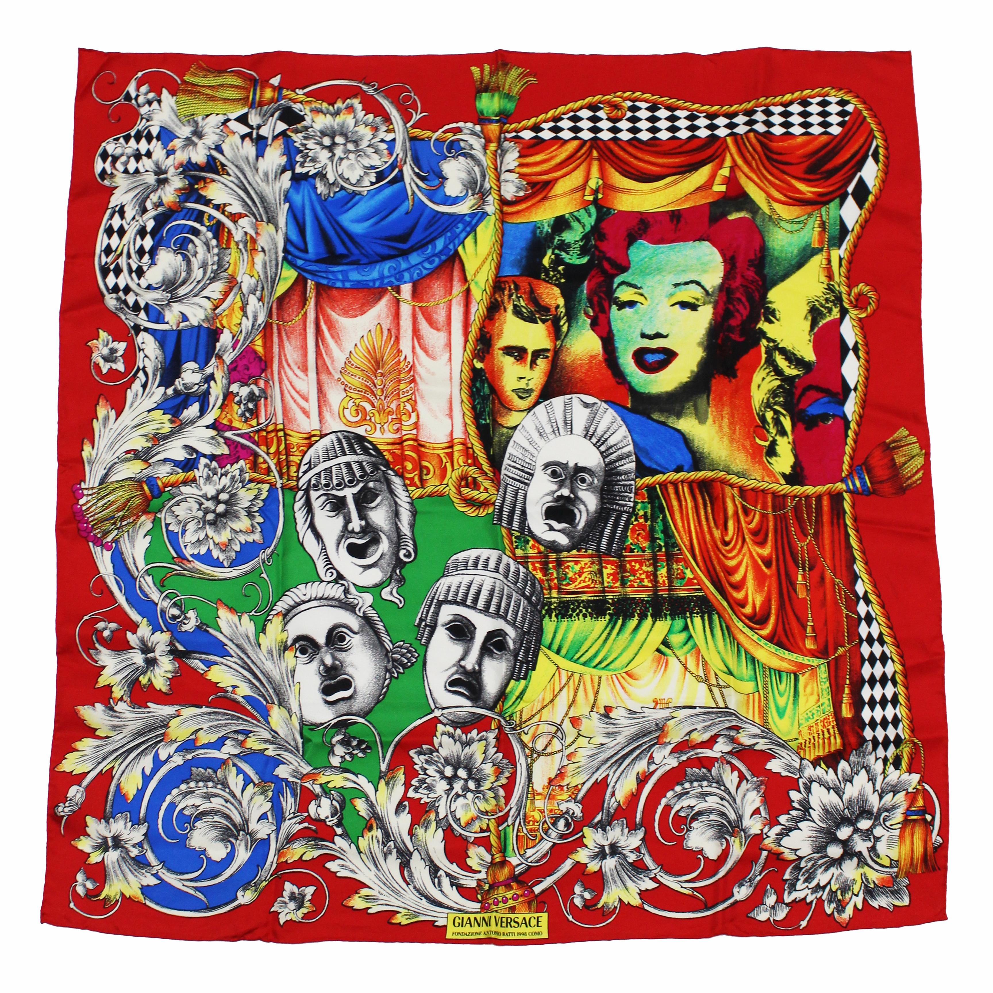 Authentic, preowned, vintage & RARE Versace Fondazione Antonio Ratti Silk Scarf or Shawl from 1998. Made from a fine silk twill fabric, this scarf features Versace's iconic pop art images of Marilyn Monroe and James Dean, as well as several Roman