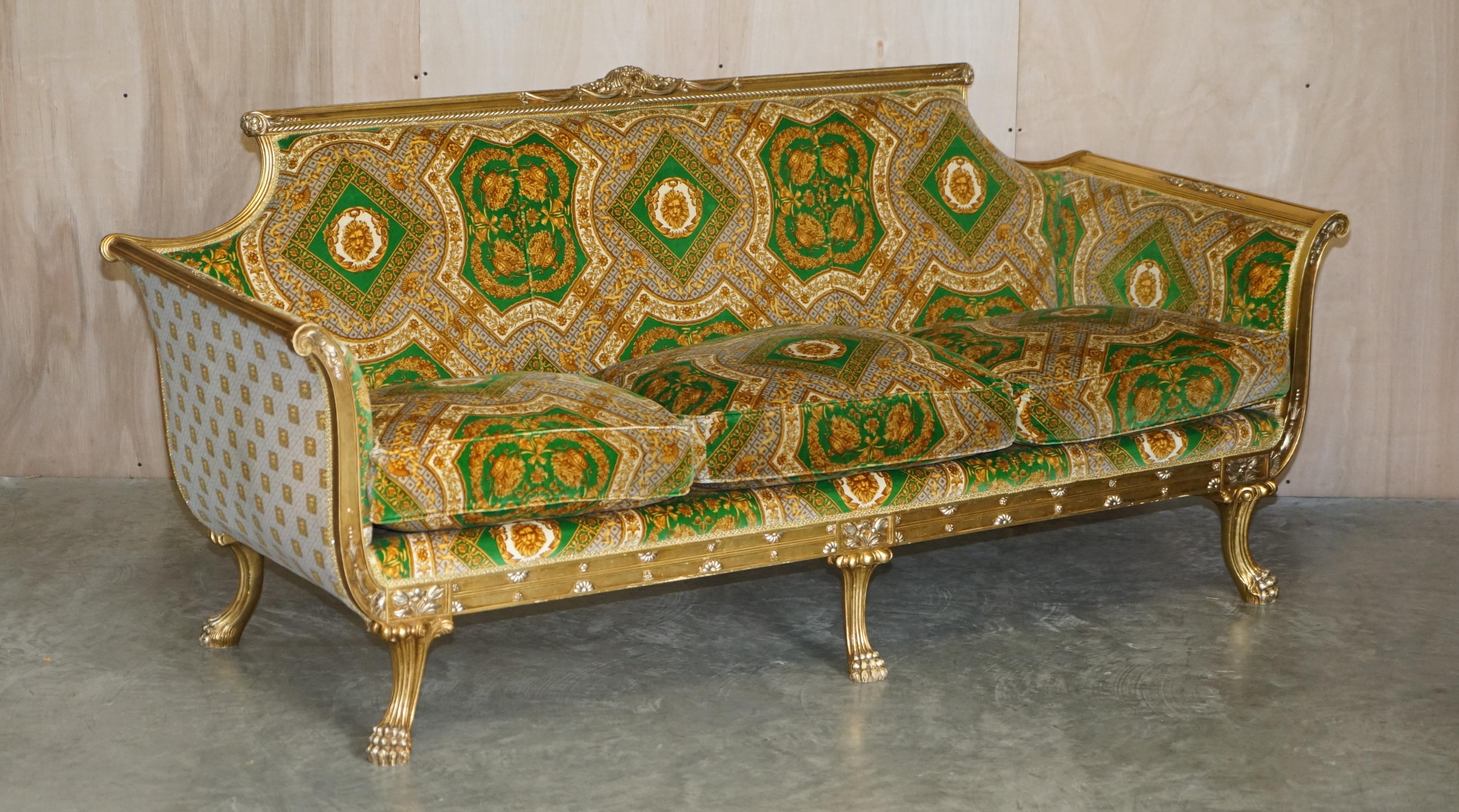 We are delighted to offer for sale this extremely well made, vintage Versace Upholstered Italian with silk velvet, Giltwood framed sofa and pair of armchairs suite.

A truly stunning and exquisitely crafted suite, the frames are hand carved oak,