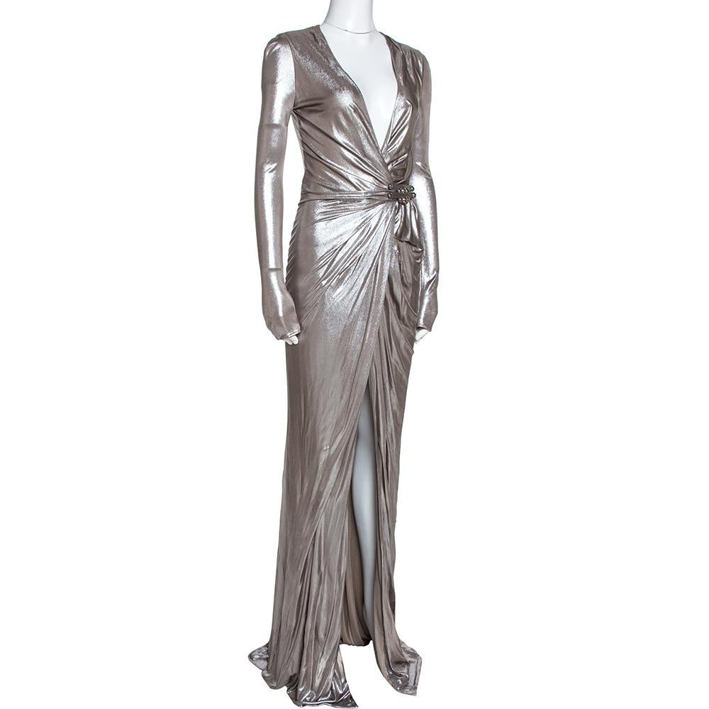 Let this glamorous Versace dress make you outshine your pals on special evenings. Designed in a wrap style with a draped silhouette, the jersey creation features a plunging neckline and is detailed with a belt on the waist. Pair it with platform