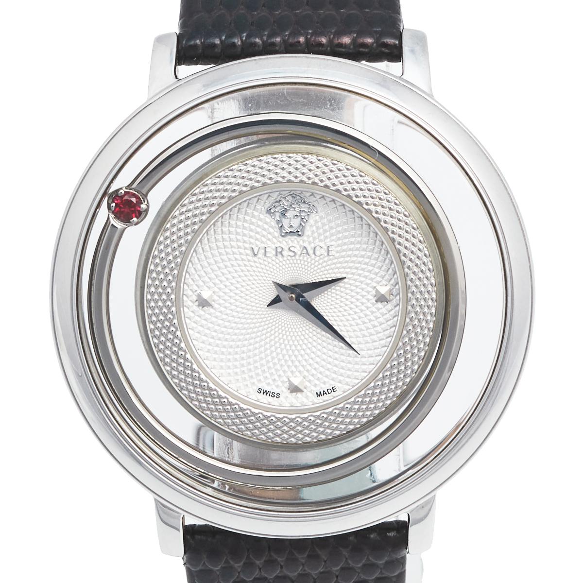 This beautiful timepiece from the house of Versace is sure to be a conversation starter with its eclectic and eye-catching design. Constructed in stainless steel, this Venus watch features a transparent panel around the case and one of the rims