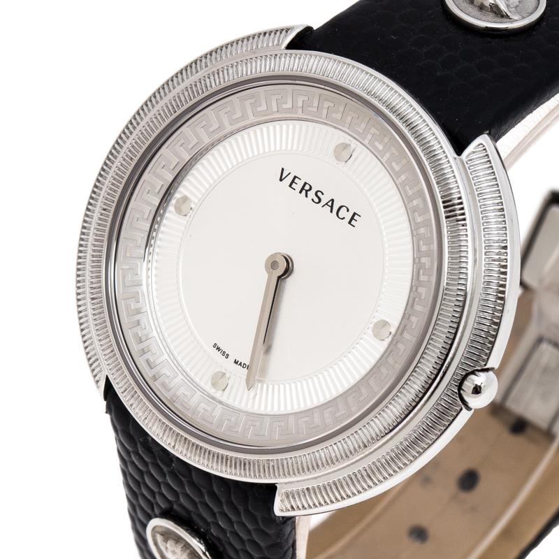 Simplicity and elegance find their way into a perfect combination with style and glamour to complete this stunning watch by Versace. Crafted out of stainless steel and held by leather, this quartz watch features dot hour markers, two hands on the