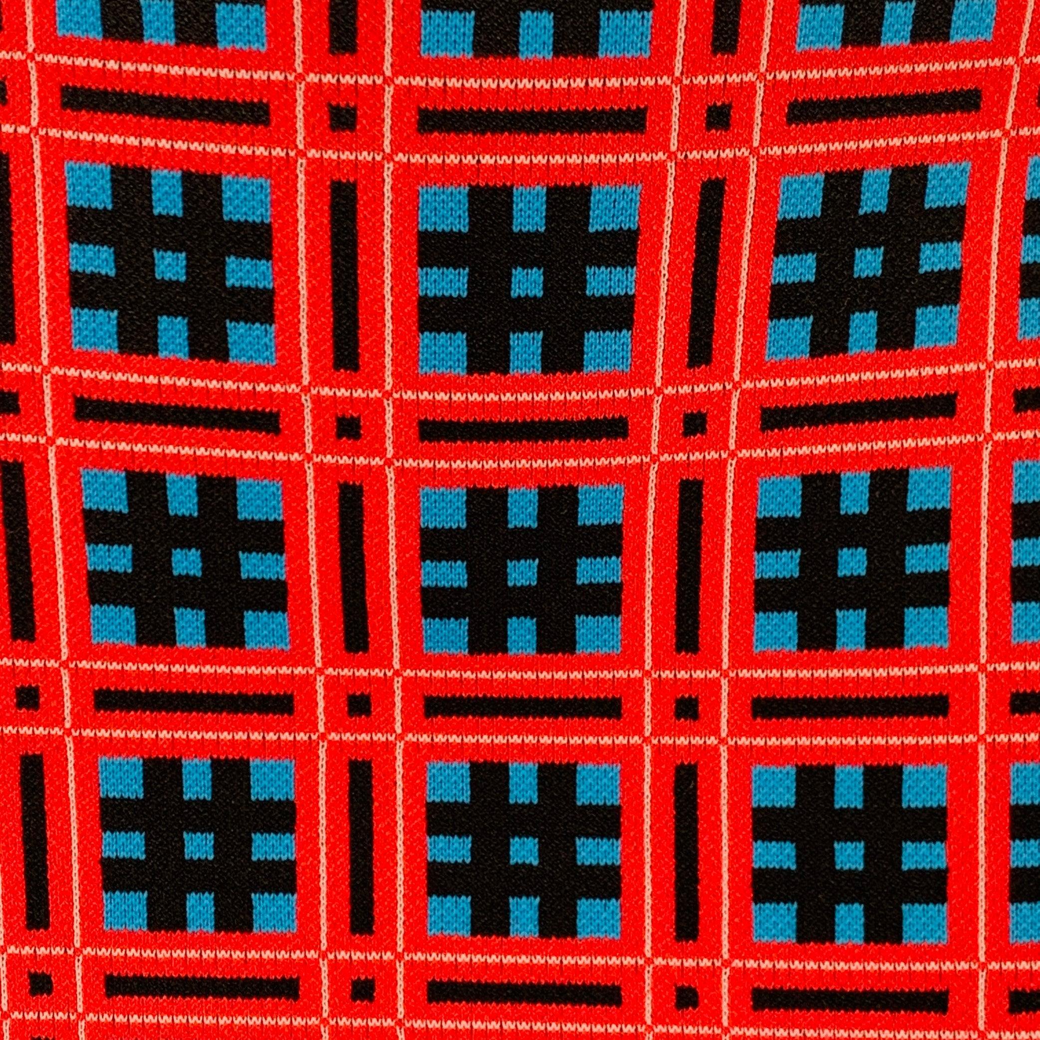 VERSACE skirt
in a red, blue, and black viscose blend jersey featuring a pencil style, geometric pattern, and pull on closure. Excellent Pre-Owned Condition. 

Marked:   IT 38 

Measurements: 
  Waist: 27 inches Hip: 30 inches Length: 23.5 inches 
