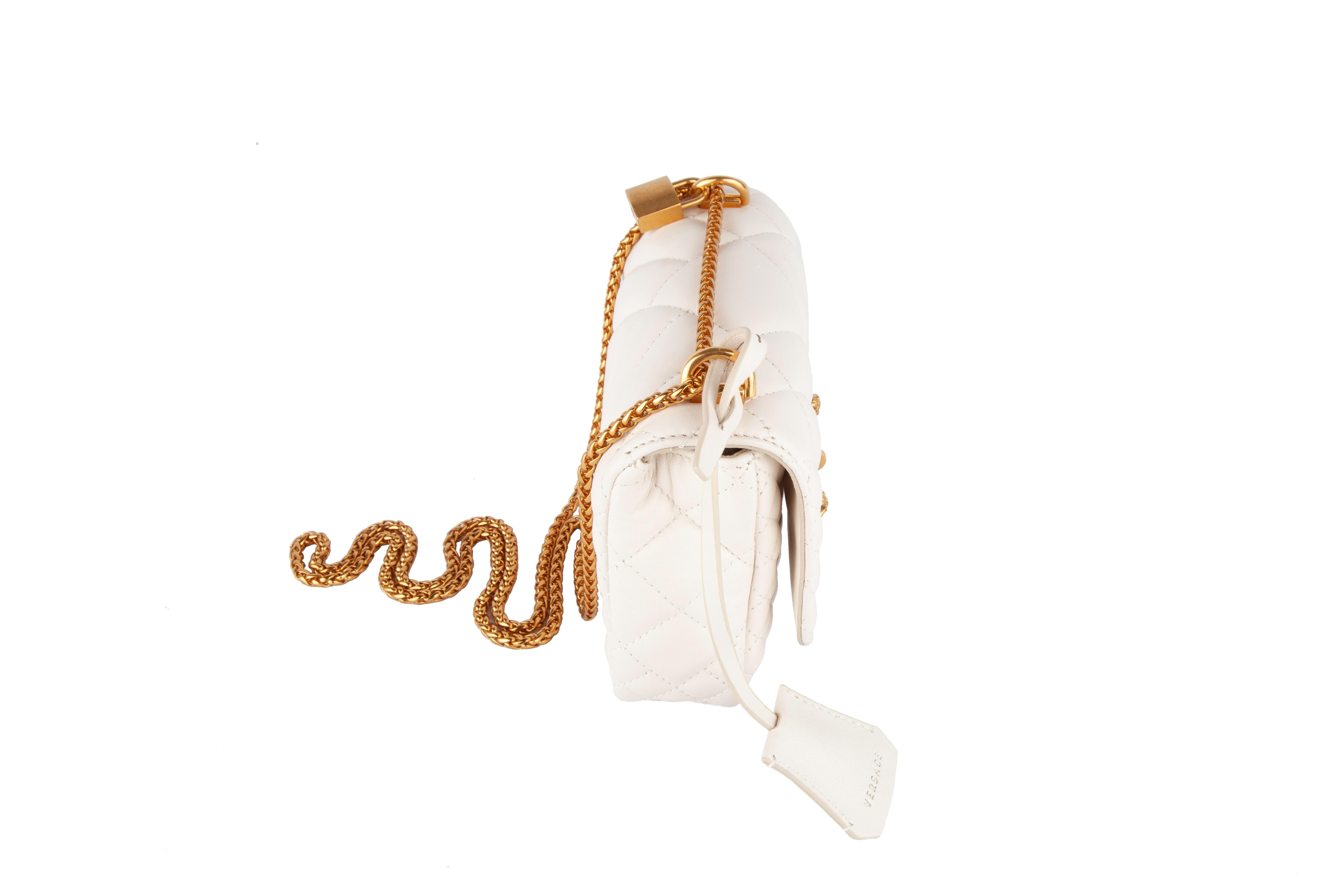 white and gold shoulder bag