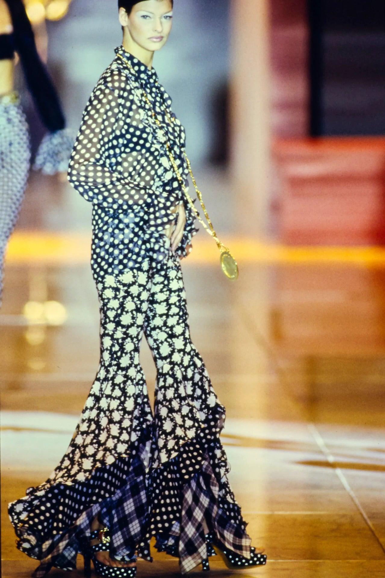 Vintage Gianni Versace
Spring 1993 - seen on the runway & in campaign images

Silk chiffon flared bell bottom trousers & bralette top set
Black & white floral pattern trousers with layered gingham & polkadot legs

Low/mid rise with zip up centre