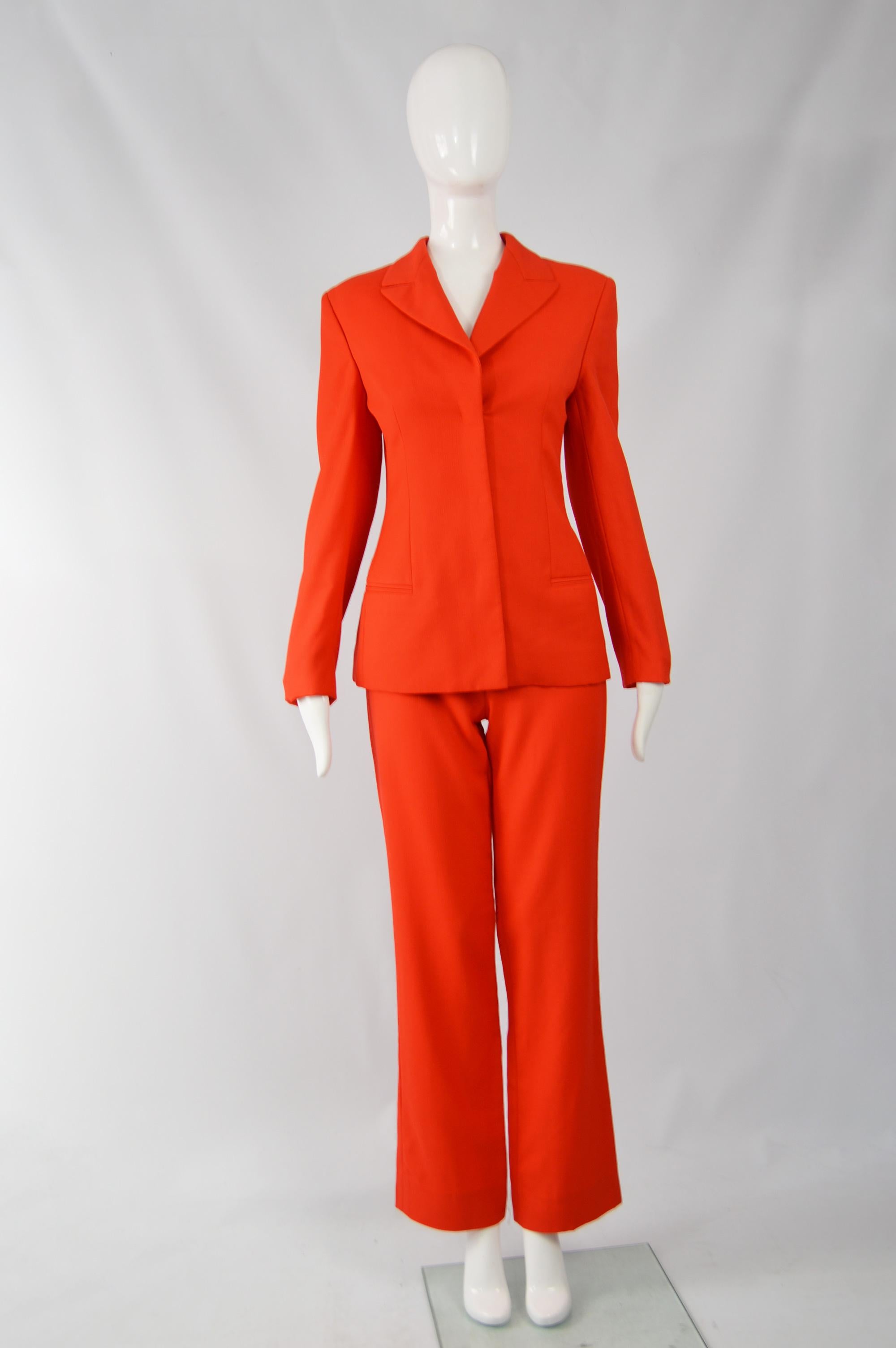 Size: Jacket Unmarked; Trousers are IT40 which translates to a UK 8/ US 4/ EU 36. Please check measurements. 
Bust - 34” / 86cm
Waist (of pants) - 27” / 68cm
Waist (of jacket) 28” / 71cm
Length of jacket (Shoulder to Hem) - 24” / 61cm
Shoulder to