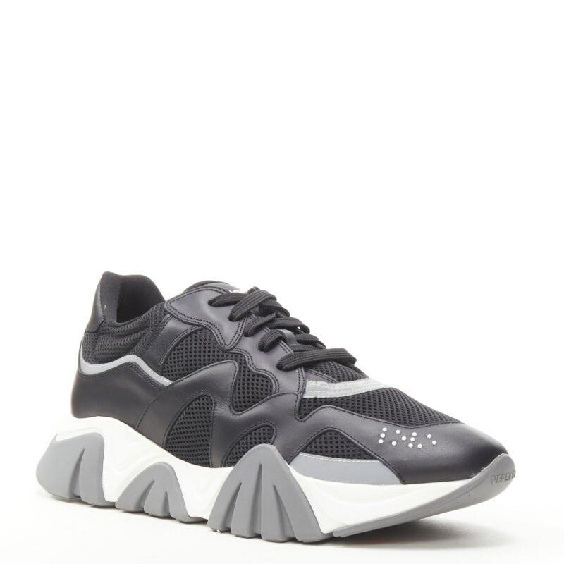 VERSACE Squalo black leather mesh chunky sneakers D41 EU45.5 US12.5
Reference: TGAS/C00185
Brand: Versace
Designer: Donatella Versace
Model: Squalo
Collection: 2020 - Runway
Material: Mesh, Leather
Color: Black
Pattern: Solid
Closure: Lace