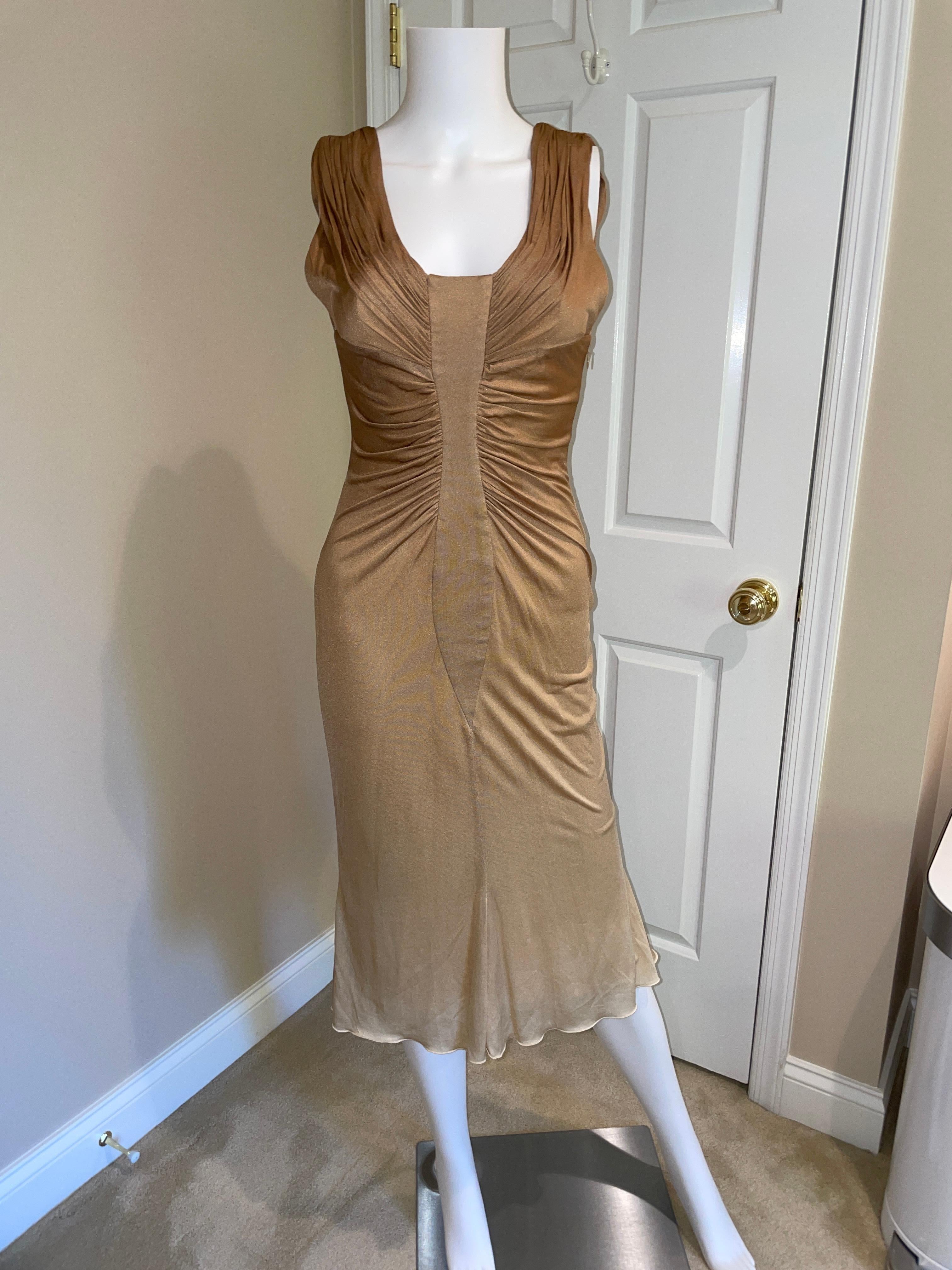 Vintage Versace ruched dress size IT40. Excellent vintage condition, very minor signs of wear including some nubbies and an almost impossible to see stain on the side towards the bottom. 100% silk (has stretch) from the SS06 runway. Starts at tan