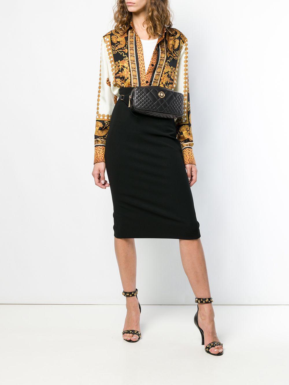 Versace SS19 Black Tribute Icon Quilted Leather Belt Bag

A pillar of luxury Italian fashion since its founding in 1978, Versace is celebrated for their glamorous details and impeccable craftsmanship which carries seamlessly onto their accessory