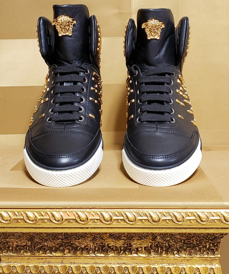VERSACE STUDDED HIGH-TOP SNEAKERS with GOLD MEDUSA side ZIPPER at 1stDibs |  black and gold high top sneakers, versace high top sneakers, black and gold  versace shoes