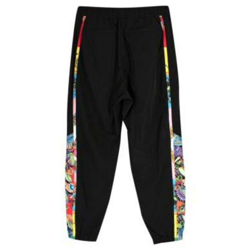 Women's Versace Tapered printed shell pants For Sale