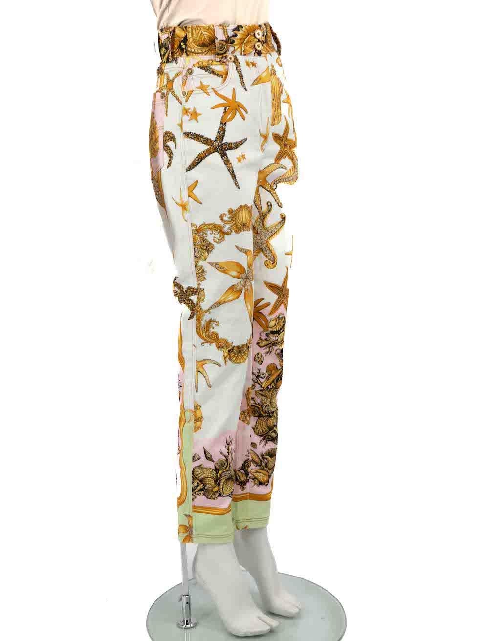 CONDITION is Never worn. No visible wear to jeans is evident on this new Versace designer resale item.
 
 
 
 Details
 
 
 Multicolour- white, gold, green, pink
 
 Denim
 
 Jeans
 
 Tresor De La Mer print
 
 Tapered fit
 
 High rise
 
 3x Front