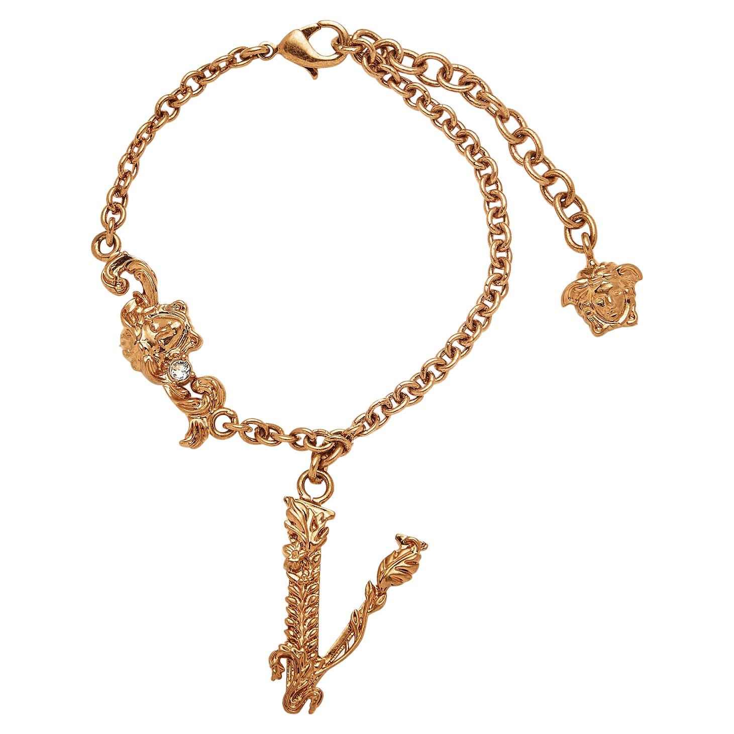 Versace Tribute Gold Bracelet with Medusa Accent and Virtus Charm