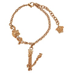 Versace Tribute Gold Bracelet with Medusa Accent and Virtus Charm