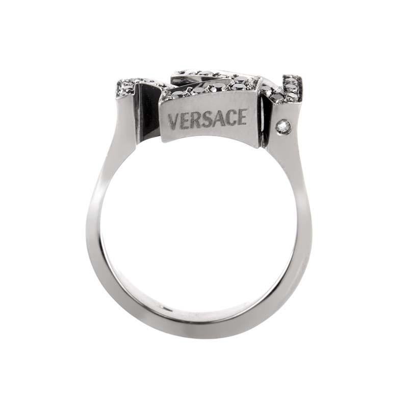 This ring from Versace's V-Divine collection is cool and shines with luxurious black diamonds. It is made of 18K white gold and is set with ~.24ct of black diamonds.
