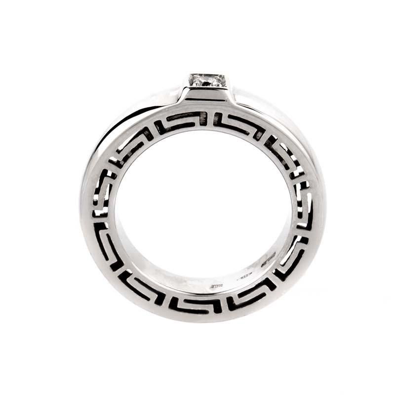 This ring from Versace's V-Profile Collection is attractive and refined. It is made of 18K white gold and boasts a bezel designed with Greco motifs and set with a single ~.18ct diamond.

