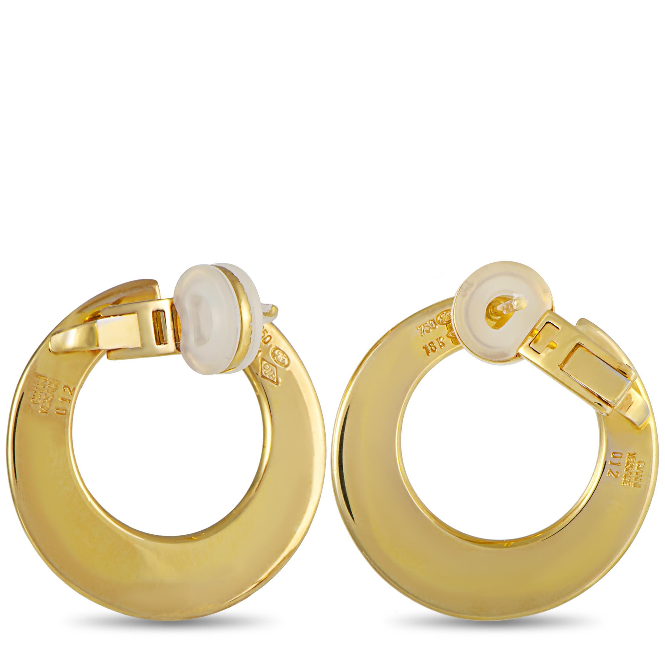 These vintage Versace earrings are made out of 18K yellow gold and enamel and each weighs 6.8 grams, measuring 1” by 1”.
The earrings include the manufacturer’s box.