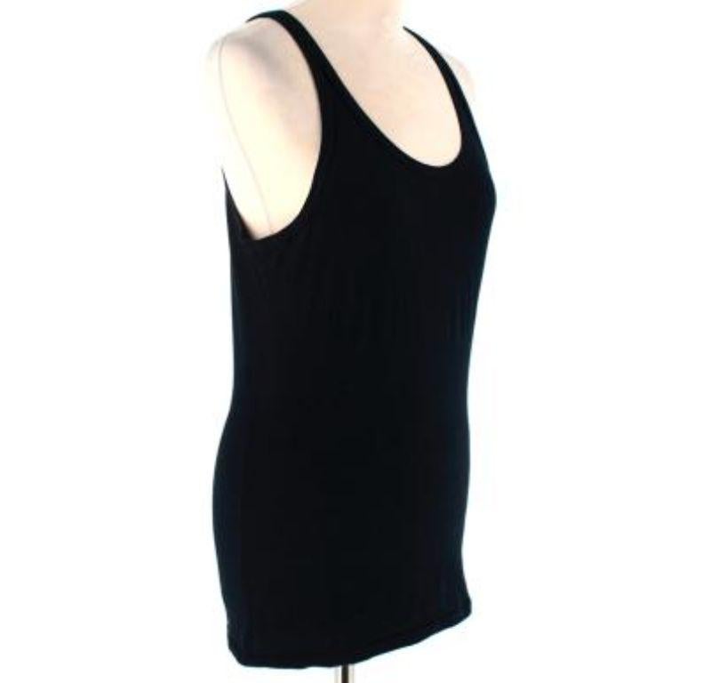 Versace Black Cotton Embroidered Patch Tank Top

-Made of soft cotton 
-Classic tank top cut 
-Embroidered detail to the back 
-Black neutral hue 
-Easy to style timeless design 

Materials:
93% cotton, 7% elastane 

Machine washable 

Made in Italy