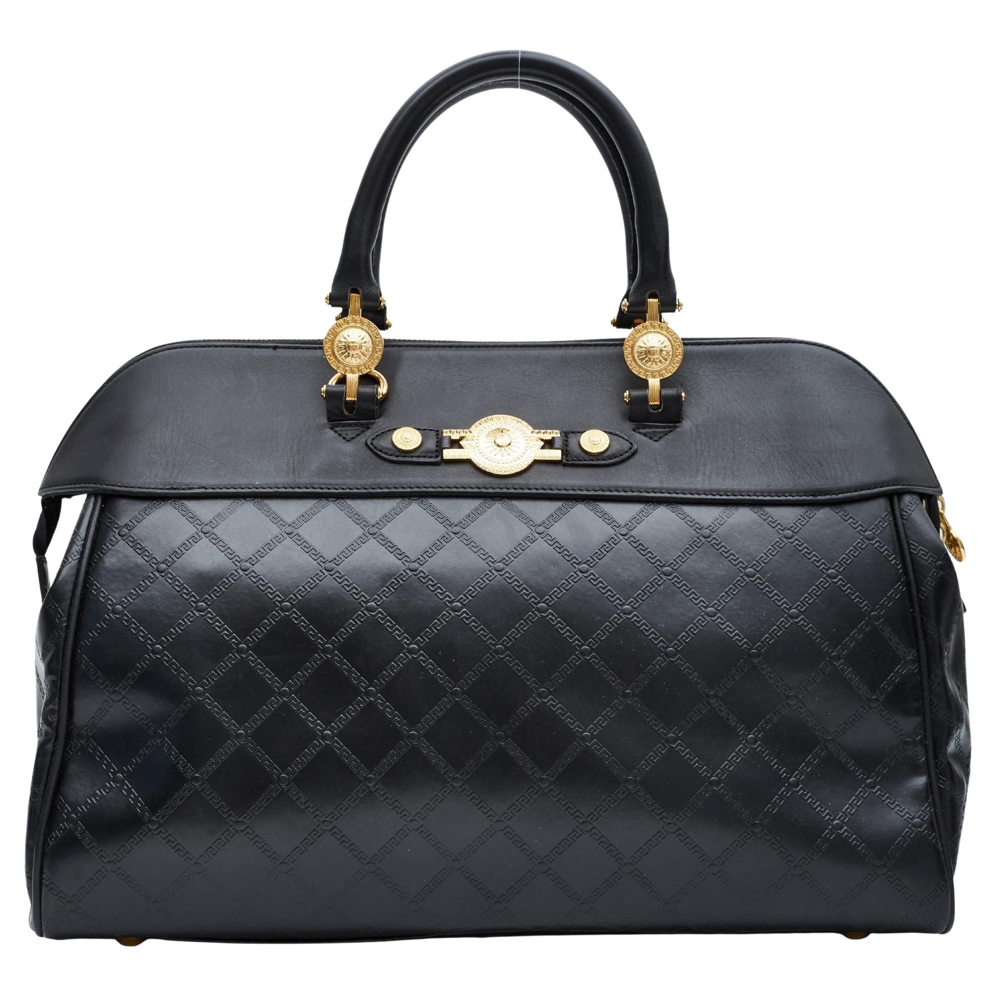 Versace Vintage Schwarze Weekend Bag aus Leder mit geprägtem Aktentasche-Motiv