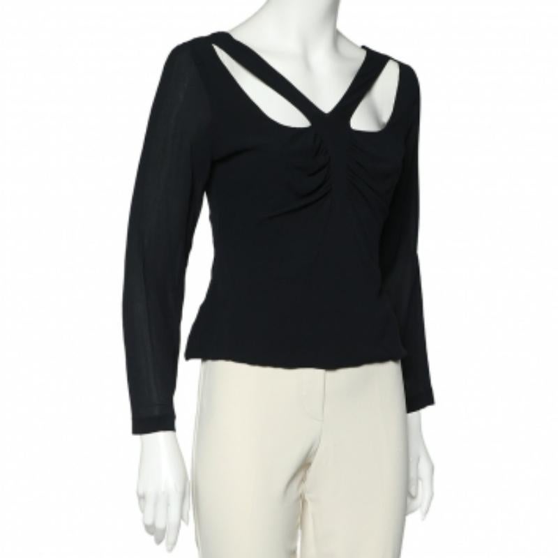 Look classy as you wear this top from the House of Versace. It is stitched using Vintage-black silk chiffon fabric and highlighted with cut-out details. It has long sleeves. This top is perfect for casual outings!