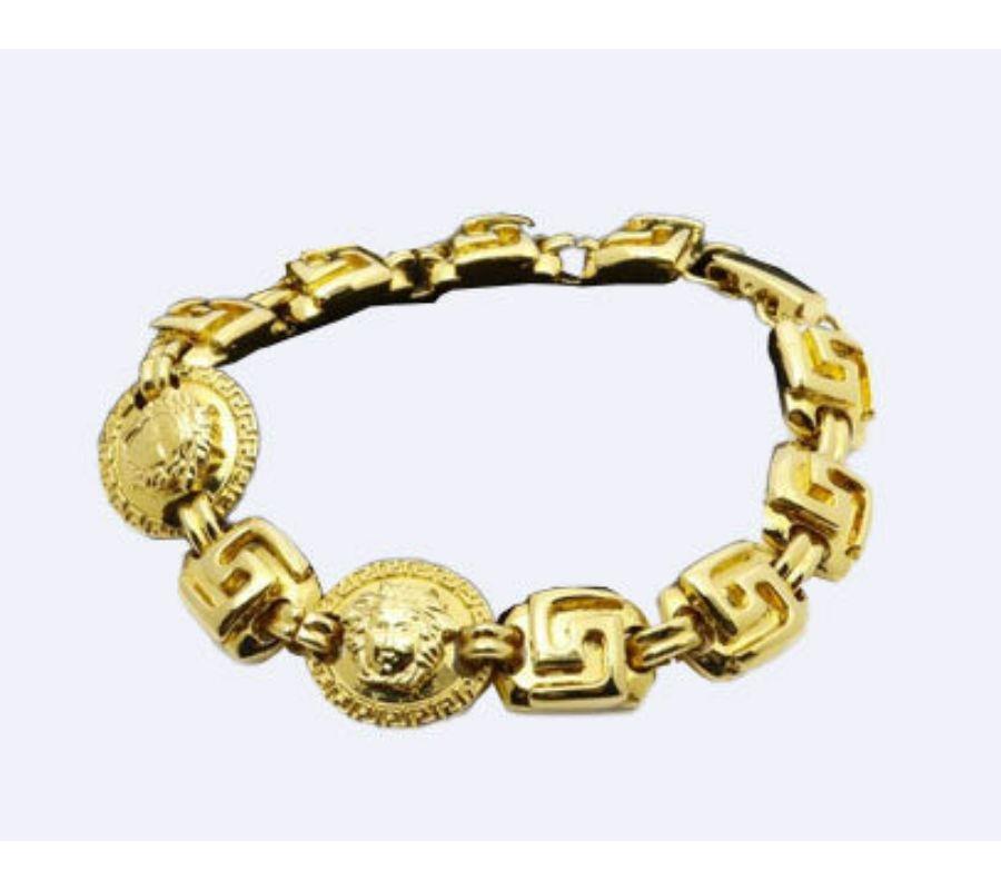 Women's Versace Vintage Bracelet features chunky gold-tone hardware For Sale