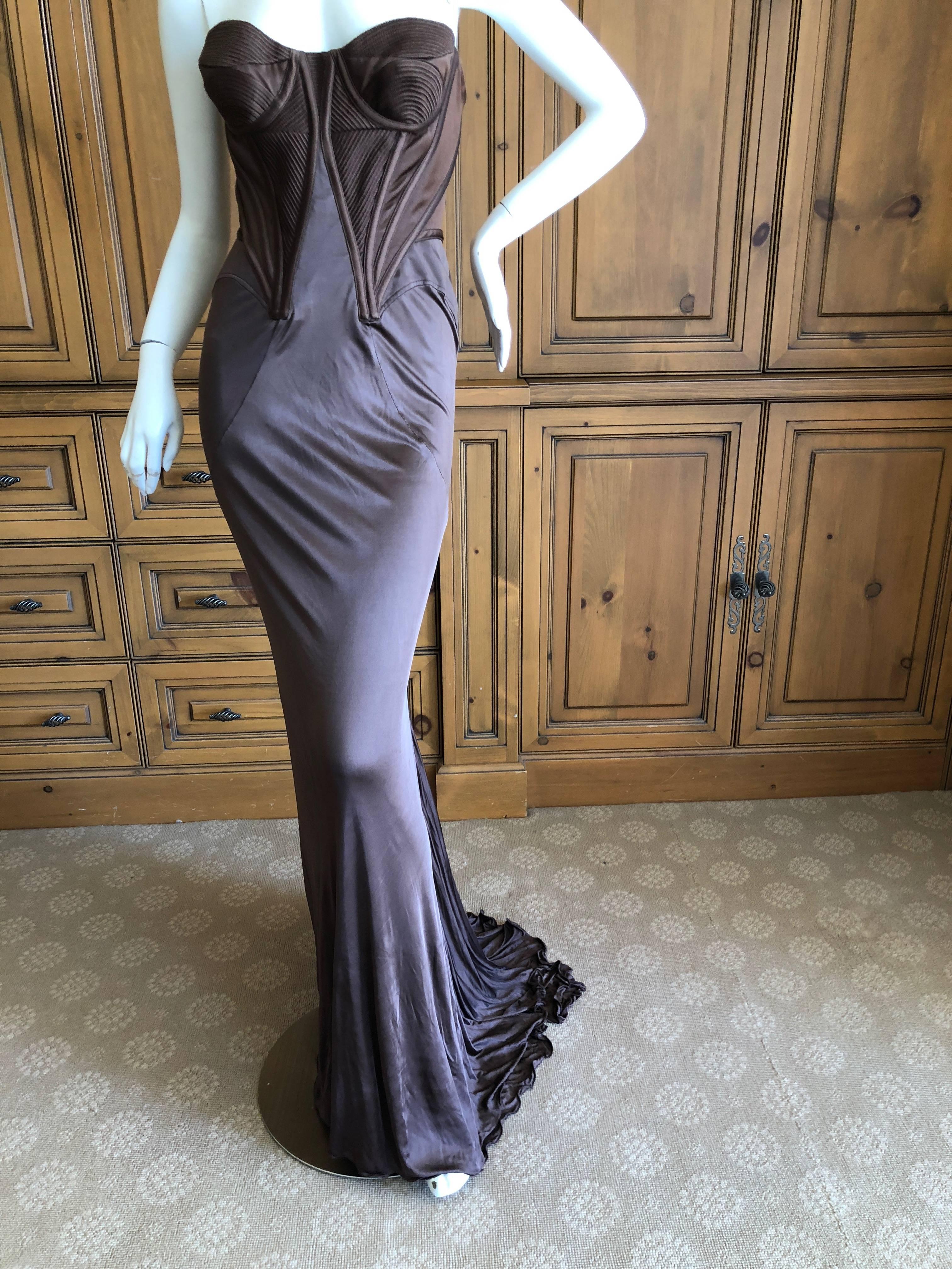 Versace Vintage strapless corset evening dress.
This is so pretty, photos don't quite capture it.
It is a rich chocolate brown, sorry the photos might appear purple.
New with tags, this originally was $8450 retail.
Size 42
 Bust: 36