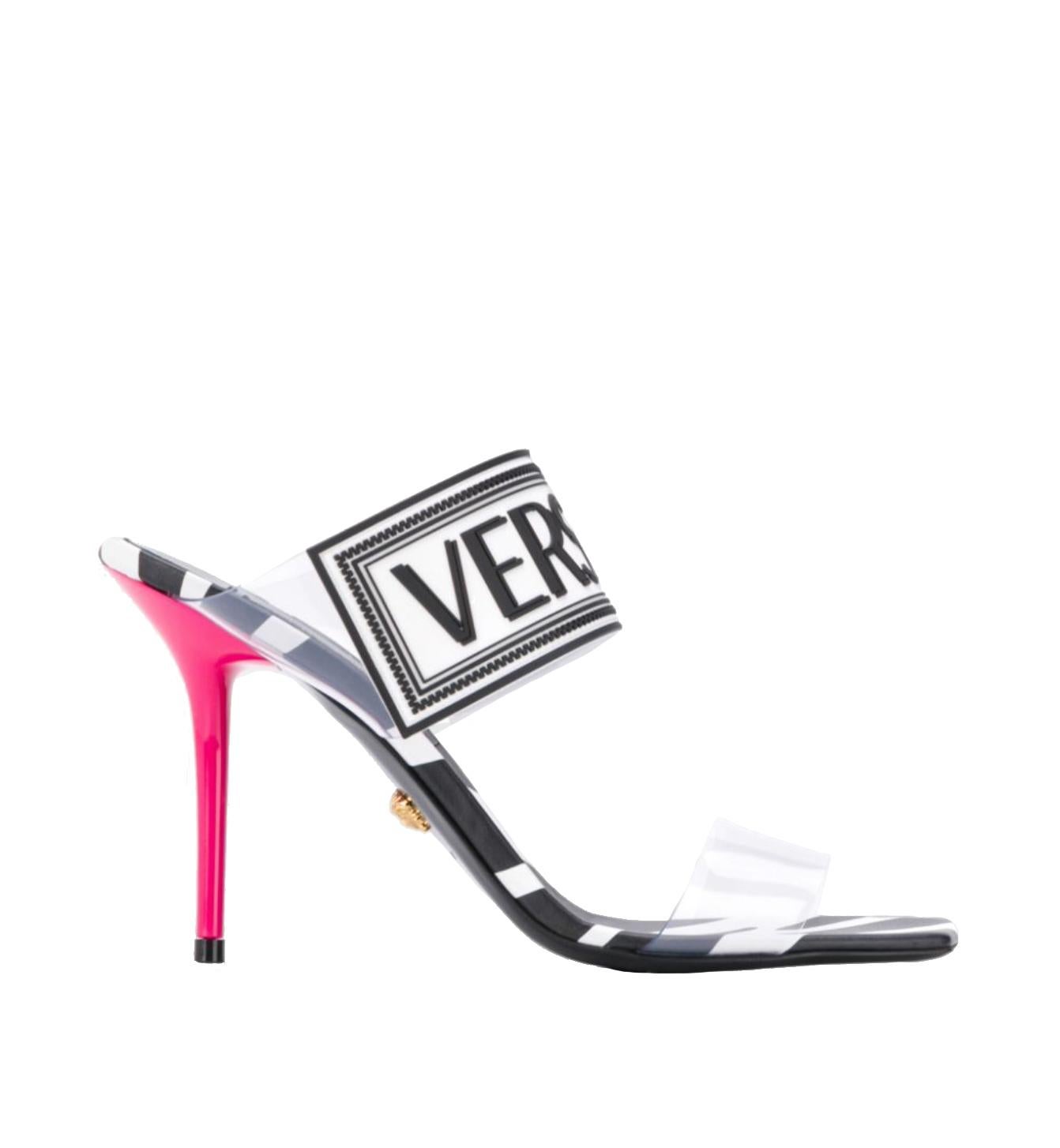 These Versace mules feature the 90s vintage logo, PVC straps, zebra print leather, a square toe, and a 95mm fuchsia stiletto heel. These are a great option to add some color and fun to your outfit. Brand new however this pair was tried on by a